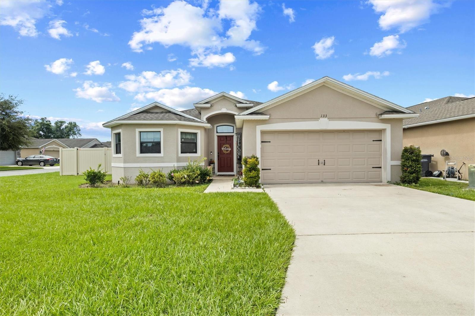 Welcome to 133 Crossing Drive, where comfort, convenience, and the best of North Lakeland come together. 

PAID OFF SOLAR PANELS, FULLY FENCED IN BACKYARD, including a PURIFIED WATER SYSTEM!!!!

This beautifully maintained home offers an inviting open-concept layout designed for both everyday living and effortless entertaining. Filled with natural light and thoughtfully designed living spaces, it's the perfect place to relax, gather with loved ones, and create lasting memories.

Step outside to enjoy your private backyard, beautifully fenced in. Ideal for morning coffee, weekend barbecues, or simply unwinding after a long day. Nestled in a friendly neighborhood, this home offers a peaceful residential setting while keeping you close to everything you need.

Located just minutes from US Highway 98 and I-4, you'll enjoy easy access to shopping, dining, and major employers. Everyday conveniences, including Publix, Walmart, Lakeland Square Mall, and a variety of restaurants, are just a short drive away. Outdoor enthusiasts will love being near Lake Gibson, Lake Parker, and several parks offering boating, fishing, walking trails, and recreation. Downtown Lakeland is only minutes away, where you'll find charming local boutiques, restaurants, coffee shops, seasonal events, and the beautiful Hollis Garden and Lake Mirror waterfront. The property also offers convenient access to LEGOLAND® Florida Resort, Bonnet Springs Park, and both Tampa and Orlando, making weekend adventures and commuting a breeze.

Whether you're searching for your first home, looking to downsize, or simply wanting a move-in ready property in a desirable Lakeland location, 133 Crossing Drive offers the warmth, comfort, and lifestyle you've been waiting for. Come experience everything this wonderful home and vibrant community have to experience!