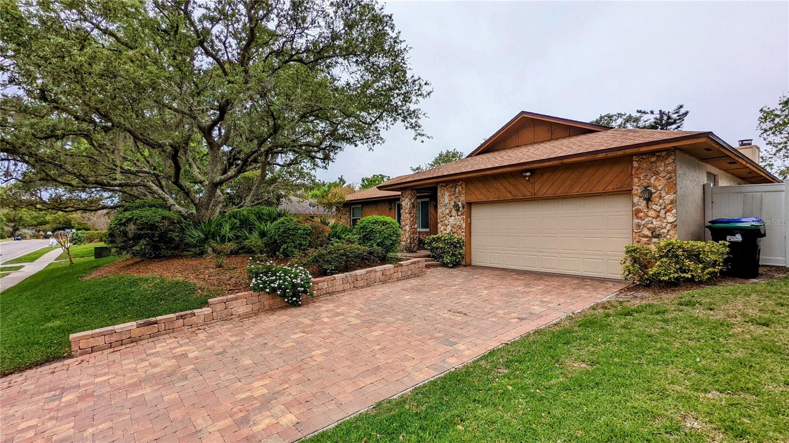 Welcome to this charming 3-bedroom, 2-bathroom home, nestled in the heart of Dr. Phillips. This delightful property boasts an oversized lot, ensuring plenty of space for outdoor activities and enjoyment. With its close proximity to A-rated schools, Sand Lake Restaurant Row, Disney World, Universal Studios Orlando, and major highways, you'll be perfectly positioned for both work and play. As you approach the home, you'll be immediately captivated by the beautiful landscaping, which provides a serene and welcoming atmosphere. Step inside to find a spacious, open floor plan filled with natural light. The living area features a cozy fireplace, creating a warm ambiance for those cooler evenings. The kitchen is a chef's dream, complete with granite countertops, ample storage space and new stainless-steel appliances, making meal preparation a pleasure. The large, covered lanai is perfect for outdoor dining, relaxation, and entertaining guests. It overlooks the expansive, fenced-in yard, providing a safe and secure environment for kids and pets to play. The generously sized bedrooms offer comfort and privacy, with the master suite featuring an en-suite bathroom. The additional two bedrooms are serviced by a second, well-appointed bathroom. This rental property is ideal for families seeking a comfortable, stylish home in a desirable location. With its combination of functionality, beauty, and convenience, this gem in Dr. Phillips is sure to be snapped up quickly. Don't miss this opportunity to make it your new home – contact us today to schedule a viewing.