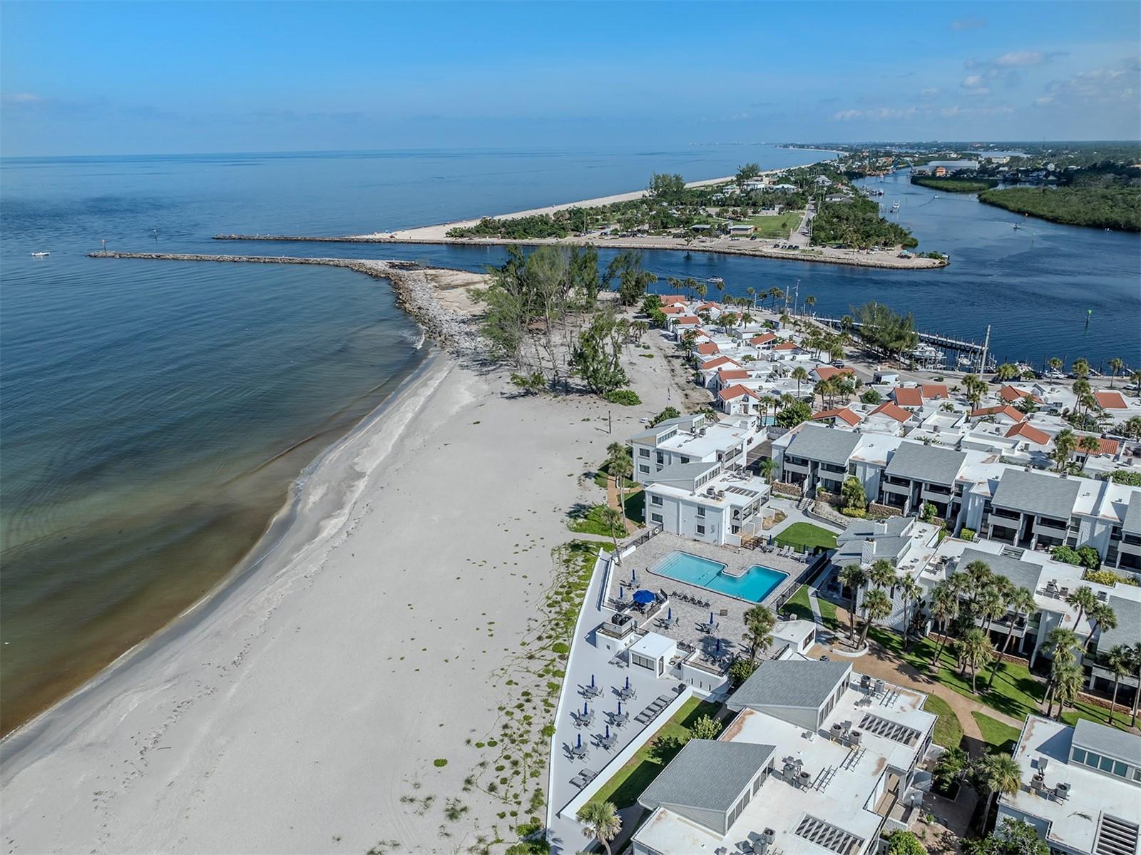 Welcome to Bahia Vista Gulf, a tropical beachfront condominium community on Venice Island offering relaxed coastal living with spectacular Gulf views. Residents enjoy a large, heated pool overlooking the beach, expansive sun decks ideal for gathering with friends and neighbors, and unforgettable sunsets over the Gulf. Unit H-242 is a light-
filled second-floor residence featuring an open-concept design with soaring ceilings and
two private balconies. The inviting living room showcases a beautiful wood-clad vaulted
ceiling and offers partial views of the Gulf of Mexico along with the lush courtyard below.
The renovated kitchen is thoughtfully updated newer appliances and includes a washer
and dryer for added convenience. A sliding glass door provides direct access to one of
the private balconies, perfect for enjoying your morning coffee or evening breeze.
Recently painted and offered turnkey furnished, this residence also features window
treatments throughout and hurricane-rated windows and sliding glass doors for
enhanced protection and peace of mind. A designated parking space and generous
ground-floor storage - ideal for beach chairs, bikes, and sporting equipment - are
included, with ample guest parking nearby. For those who prefer low-rise living, this
charming tropical community offers an intimate alternative to high-rise condos, all within
one of Venice Island’s most desirable beachfront settings.