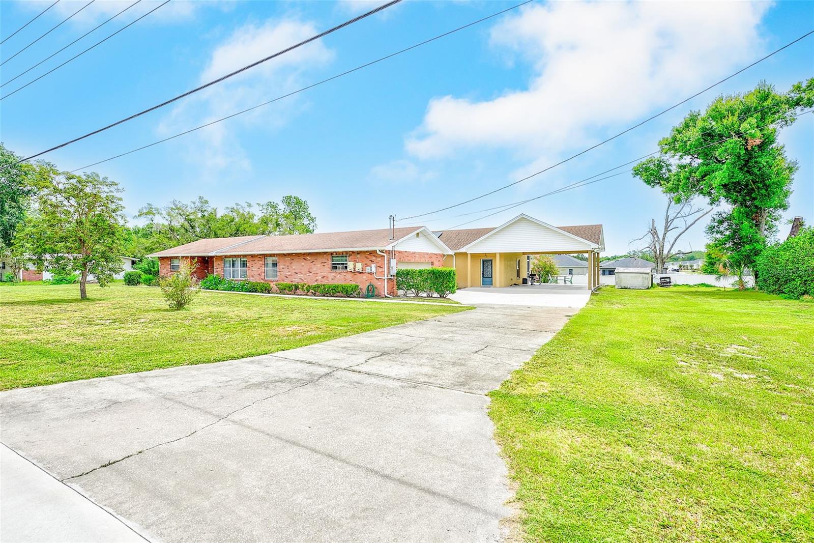 CAN YOU SAY ASSUMABLE MORTGAGE WITH A 2.25% INTEREST RATE??? One of the most attractive features of this property —a significant advantage that could result in substantial savings compared to today's interest rates. Discover the perfect blend of space, flexibility, and affordability that awaits you with this beautifully maintained home with mother-in-law retreat and NO HOA! Offering 3,146 square feet of total living space with 6 bedrooms and 4 bathrooms, this unique property was thoughtfully expanded to accommodate and care for an elderly family member, creating an ideal setup for multigenerational living or extended family needs. The addition, completed in 2016, was designed with accessibility and comfort in mind, featuring handicap-accessible accommodations that make daily living easier for residents of all abilities. Whether you're caring for aging parents, welcoming extended family, or simply seeking a home with versatile living arrangements, this property provides a rare opportunity to do so with ease and independence. Inside, you'll notice a beautifully remodeled kitchen with new LG black stainless steel appliances, the freshly painted interior offers a bright and welcoming atmosphere, while an updated guest bathroom provides a charming cast-iron tub that adds a touch of timeless character, where you can soak all your troubles away. Major system updates include two A/C units replaced in 2021 and 2024, providing efficiency and peace of mind for years to come. The home's oversized septic system supports the property's expanded living capacity. Situated on a generous lot, the outdoor space offers endless possibilities for gardening, entertaining, recreation, or future enhancements. With six bedrooms already in place, there is plenty of room for large families, home offices, hobby spaces, or guest accommodations. Conveniently located near shopping, schools, restaurants, and parks, this home combines practical functionality with exceptional value. Whether you're seeking a home designed for multigenerational living, a property with room to grow, or an opportunity to take advantage of a low-rate assumable mortgage, this unique opportunity deserves a closer look. Schedule your private showing today and explore the possibilities this versatile Mulberry home has to offer.