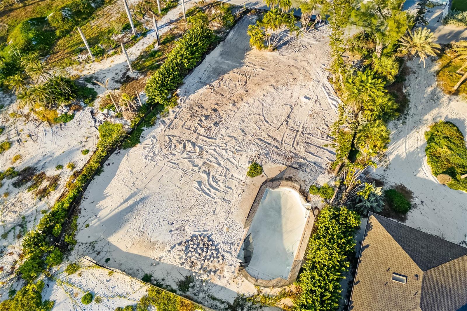 A rare opportunity to create your dream coastal estate on one of Longboat Key’s most coveted beachfront addresses. This .73-acre Gulf-front lot offers 100 feet of pristine shoreline along the turquoise waters of the Gulf of Mexico. The former residence and garage have been professionally demolished, leaving a clean slate for your architectural vision — whether a contemporary masterpiece or timeless island retreat.

Set amid multi-million-dollar estates on a peaceful, low-traffic stretch of Gulfside Road, this expansive property provides direct beach access and panoramic sunset views that stretch endlessly across the horizon. With ample depth for a grand residence, pool, and outdoor living spaces, it presents the perfect canvas for those seeking privacy, exclusivity, and the ultimate waterfront lifestyle.

Conveniently located just minutes from St. Armands Circle, the Longboat Key Club, and downtown Sarasota, this is one of the last remaining buildable Gulf-front parcels of its size. A truly rare find for discerning buyers and developers alike — your Gulf-front legacy begins here. Owner is open to terms of owner financing—a rare chance to own one of the island’s last premier Gulf-front parcels!