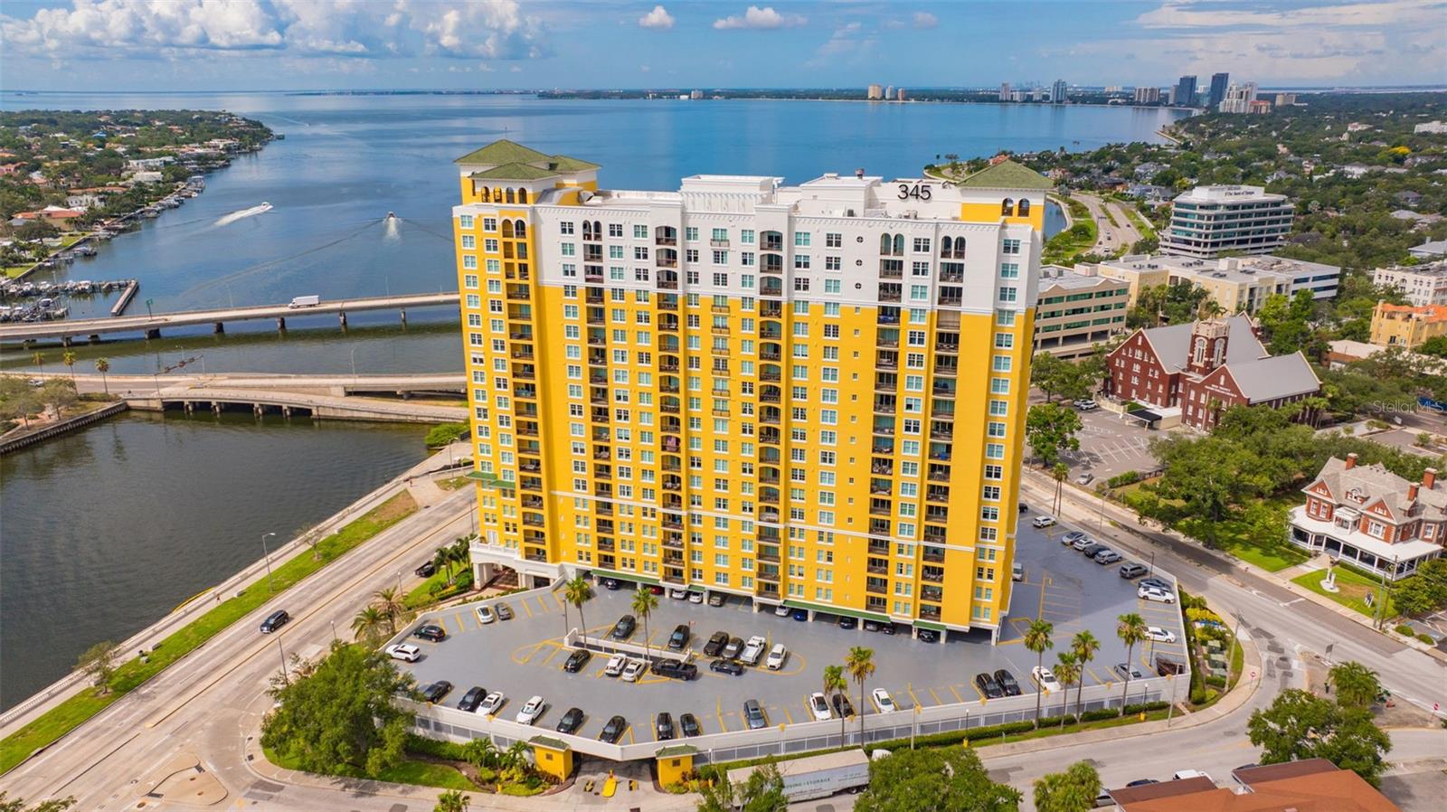 Top-Floor Grand Penthouse! Location, luxury, and lifestyle collide at 345 Bayshore Blvd, offering a beautiful view of the city and the entire bay right outside your window. This pristine residence has been completely updated, including a modernized kitchen (cabinets, backsplash, stone counter tops, GE appliances) updated both bathrooms guest and primary (vanities, countertops, showers and toilets)  sleek luxury vinyl plank floors through out the entire home as well as fresh interior paint in every room, high ceilings and the primary bedroom has a premium custom walk-in closet by Closets by Design. Ultimate peace of mind is built right in: the building's roof was replaced less than two years ago, the exterior was fully painted and sealed in 2026, and the property is heavily monitored by a robust 142-camera security system alongside a 24-hour security guard. Book your showing today!

The building amenities are second to none, providing a true five-star vacation experience. Residents enjoy 24/7 front desk services, an on-site property management team, two fitness centers, a library, social club rooms, a sauna, a dedicated pet walk, and secure bike storage. The recently renovated, resort-style heated pool and spa features elegant fountains and luxe stone pavers, while exclusive access to two on-site guest suites makes hosting visiting friends and family entirely seamless.

Positioned in the absolute best location on iconic Bayshore Boulevard, you are directly across from Tampa General Hospital and adjacent to downtown Tampa, the Riverwalk, Davis Islands, and Hyde Park Village. Live in the heart of it all next door to Publix, local dining, parks, and nightlife.