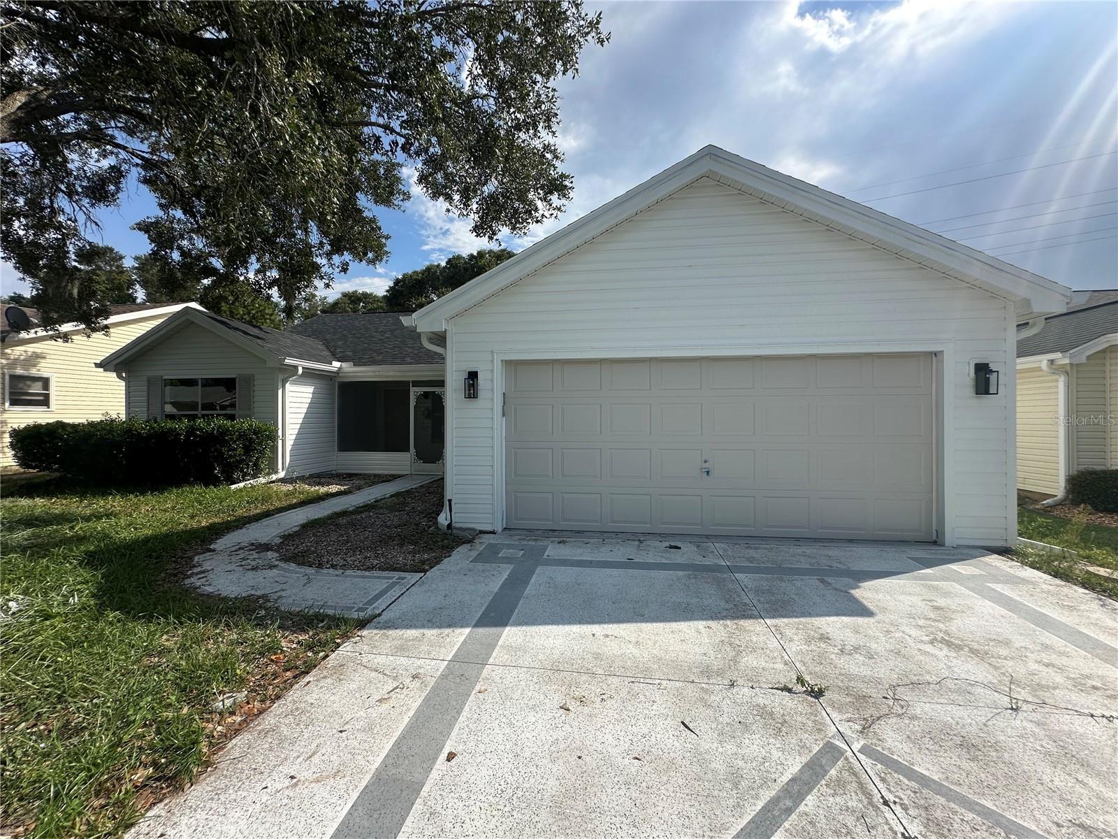 ** More photos soon.** Welcome to effortless Florida living in this beautifully renovated 3-bedroom, 2-bath pool home located in the desirable Village Rio Grande  in The Villages. Offering approximately 1,392 square feet of comfortable living space, this move-in-ready residence has been thoughtfully updated inside and out plus Brand new Water Heater.
Major improvements include a NEW ROOF in 2026, fresh interior and exterior paint, new stainless steel kitchen appliances, a beautifully remodeled kitchen, and two renovated bathrooms featuring stylish tile showers. Ceramic tile and luxury vinyl plank flooring provide an attractive, durable, and low-maintenance finish throughout the home.
The property also features a spacious 2-car garage and a 2-car driveway, providing plenty of parking and storage space. Step outside to your own private Florida retreat, complete with a beautifully updated swimming pool and screened pool enclosure—perfect for relaxing, entertaining guests, or enjoying the Florida sunshine year-round.
Conveniently located near golf courses, recreation centers, shopping, dining, medical facilities, and the entertainment of Spanish Springs Town Square and Lake Sumter Landing Market Square, this home offers the location and lifestyle that make The Villages so special.
With the major updates already completed, all that is left to do is move in and enjoy. Schedule your private showing today and make this beautifully renovated pool home yours before someone else does!