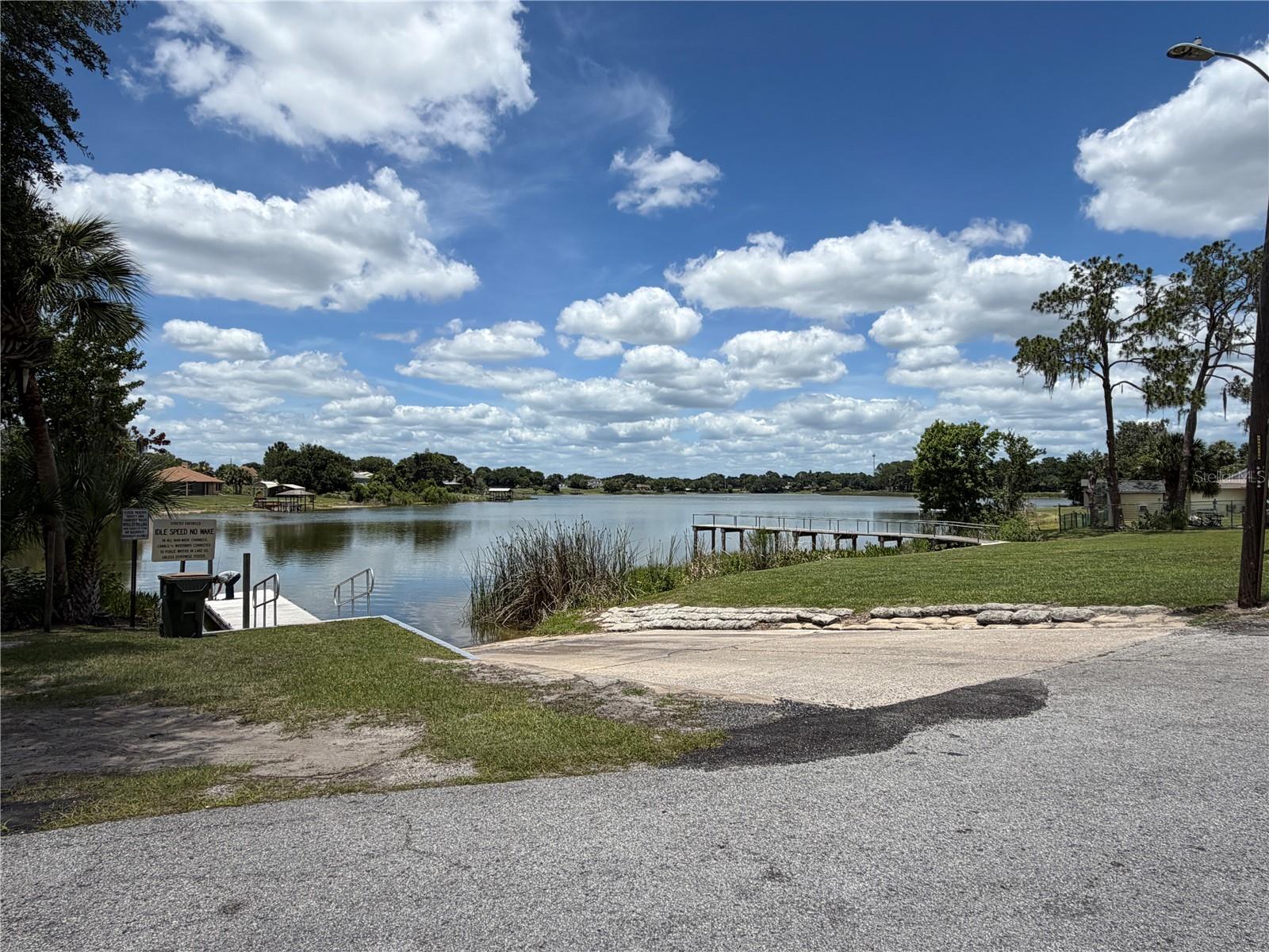 Build your dream home on this beautiful lakefront homesite with direct frontage on Lake Umatilla! Offering over half an acre of land, this rare opportunity combines peaceful waterfront living with plenty of space to create the custom home you've always envisioned. Enjoy breathtaking views of Lake Umatilla, a pristine 168± acre lake perfect for boating, fishing, kayaking, paddleboarding, and other outdoor activities. Imagine starting your mornings with coffee overlooking the water and ending your evenings with stunning lake sunsets right from your backyard. Located on a quiet cul-de-sac, this property offers both privacy and convenience. The public boat ramp is just steps away, making it easy to get out on the water and enjoy everything this beautiful lake has. Whether you're ready to build now or looking for a special waterfront property to hold for the future, this lot presents an incredible opportunity in a peaceful Central Florida setting.
