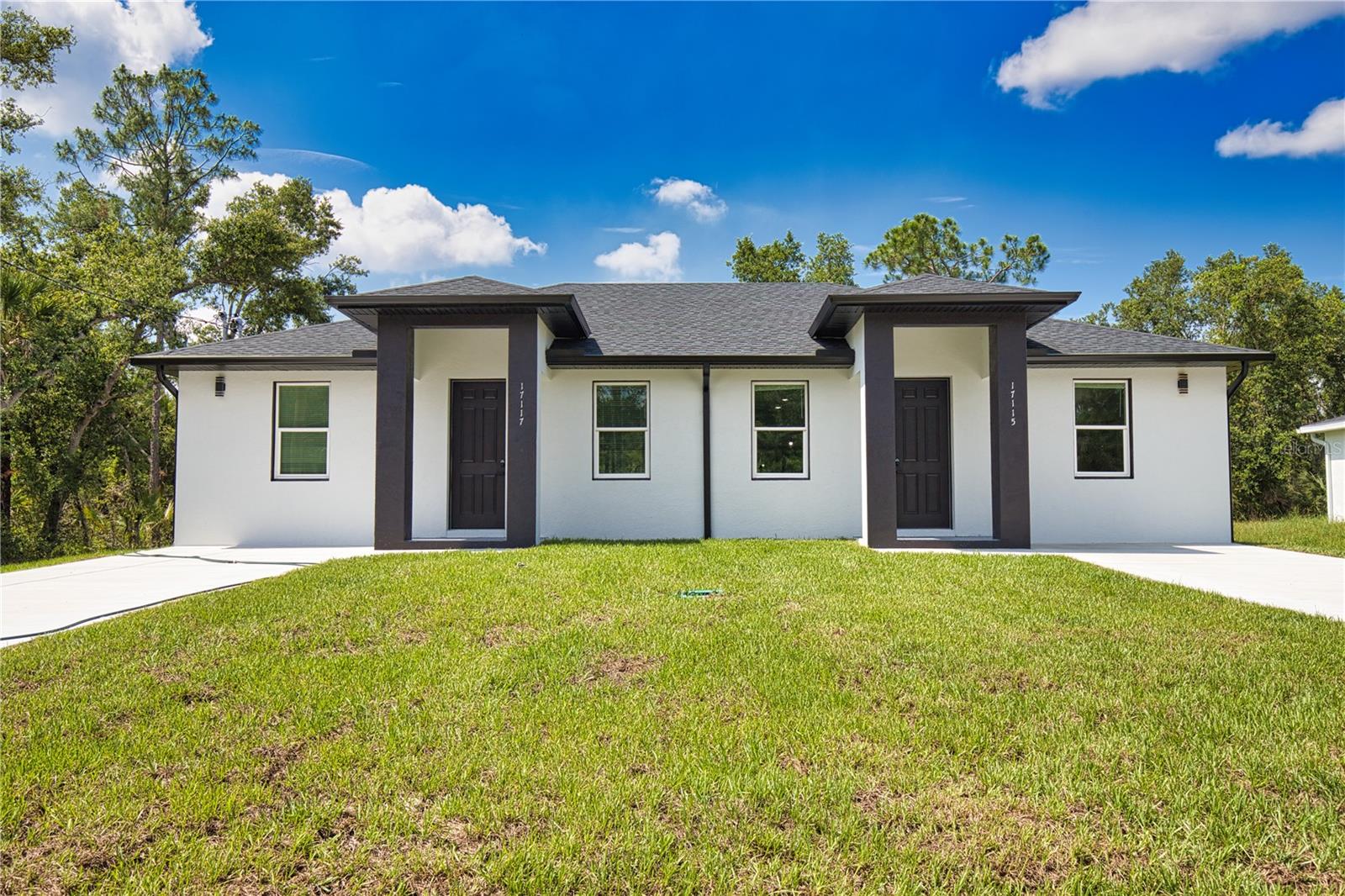 **LIVE IN ONE SIDE, RENT THE OTHER! Immediate income-producing duplex with one unit already leased at $1,600/month.**

SNOWBIRDS, INVESTORS, AND SAVVY BUYERS—this is the opportunity you've been waiting for!

Welcome to this brand-new duplex in the heart of Port Charlotte, offering the perfect blend of lifestyle, flexibility, and investment potential. One unit is already leased for $1,600 per month, providing instant cash flow from day one while you occupy or lease the second unit.

Whether you're looking for a seasonal Florida retreat, a primary residence with supplemental income, or a turnkey investment property, this duplex delivers exceptional value. Live in one side during the winter months and let rental income help offset your expenses, or maximize your returns by leasing both units.

Each unit features a bright open-concept layout, modern finishes, stylish kitchens with contemporary cabinetry, spacious bedrooms, durable low-maintenance materials, and thoughtfully designed living spaces that appeal to today's renters and homeowners alike.

Built for comfort and peace of mind, the property includes **impact-resistant windows**, helping provide added storm protection, energy efficiency, and insurance benefits. The home is also serviced by **well and septic**, eliminating water and sewer bills and helping keep operating expenses lower.

Conveniently located just minutes from Port Charlotte Town Center, Target, Sam's Club, Publix, popular restaurants, golf courses, medical facilities, and everyday conveniences. Residents will also enjoy easy access to boating, fishing, parks, and some of Southwest Florida's most beautiful Gulf Coast beaches.

With strong rental demand, a growing population, and Florida's year-round appeal, this move-in-ready duplex presents an outstanding opportunity for both investors and snowbirds seeking income potential and long-term appreciation.

Schedule your private showing today and start enjoying the Florida lifestyle while your investment works for you!