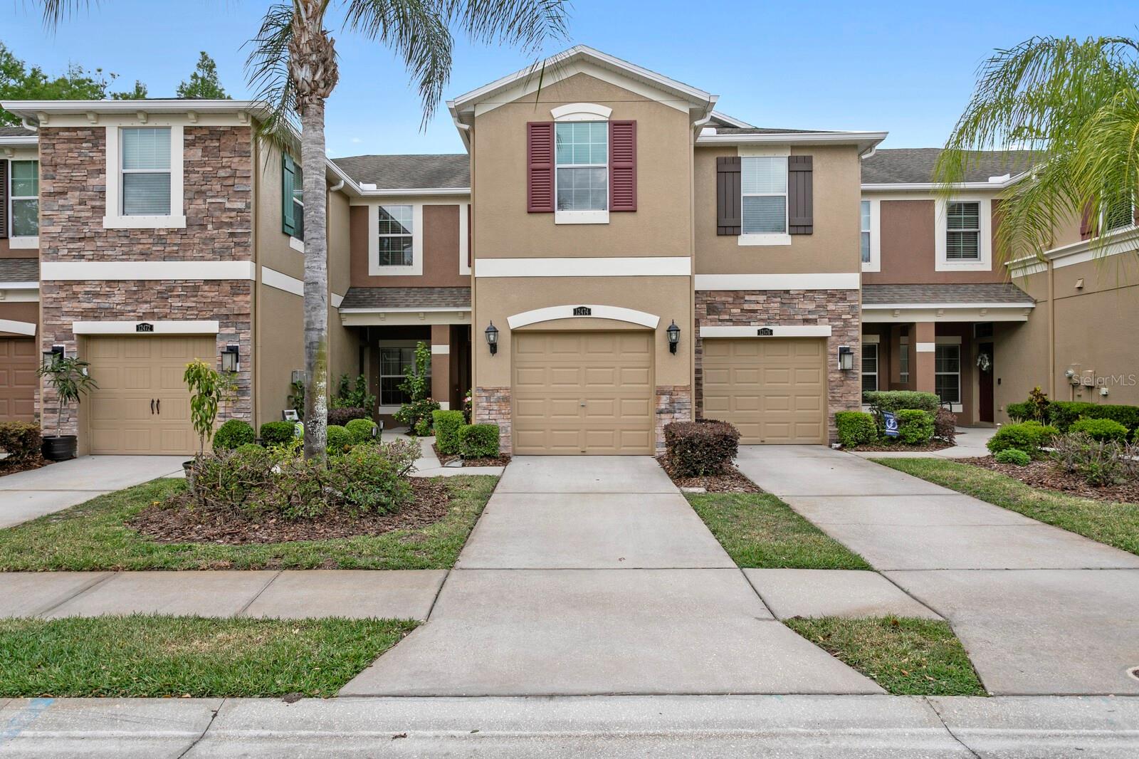 Welcome to 12474 Streamdale Dr, a meticulously cared for, well-upgraded town home in the gated, desirable South Hampton community. Ideally located near Citrus Park Town Center, Westchase, Oldsmar, and just 20 minutes from Tampa International Airport, this 2 bedroom plus loft, 2 and a half bathroom townhome offers an open concept living space, with the well-appointed kitchen (granite counter tops, newly painted cupboards, stainless steel appliances!) overlooking the large living room/dining room combo, all with luxury vinyl flooring. Upstairs find the 2 split bedrooms separated by a large bonus space, perfect for a home office or separate living area. The 15x14 ft primary bedroom offers his and hers closets and private bath, complete with double vanity and glass shower. Nice sized 2nd bedroom comes with a murphy bed, perfect for dual use bedroom/office. Just a stones throw from recreational and outdoor amenities, including Forrest Hill Recreation Complex (featuring a waterpark and splash pad), nature trails, Oldsmar Flea Market, Tampa Bay Downs, and many more. RECENT UPGRADES: Security System, Kitchen cabinets painted (2025), New Carpet (2025) Upstairs painted (2023), Range and Microwave (2023) Ceiling Fans (2022) Refrigerator (2022) AC (2021) Luxury Vinyl Flooring downstairs (2019) Crown Molding (2016) Overhead Storage Rack in garage. This home is the definition of move-in ready and zoned for top-rated Mary Bryant Elementary, Farnell Middle and Sickles High Schools. Schedule your appointment today.