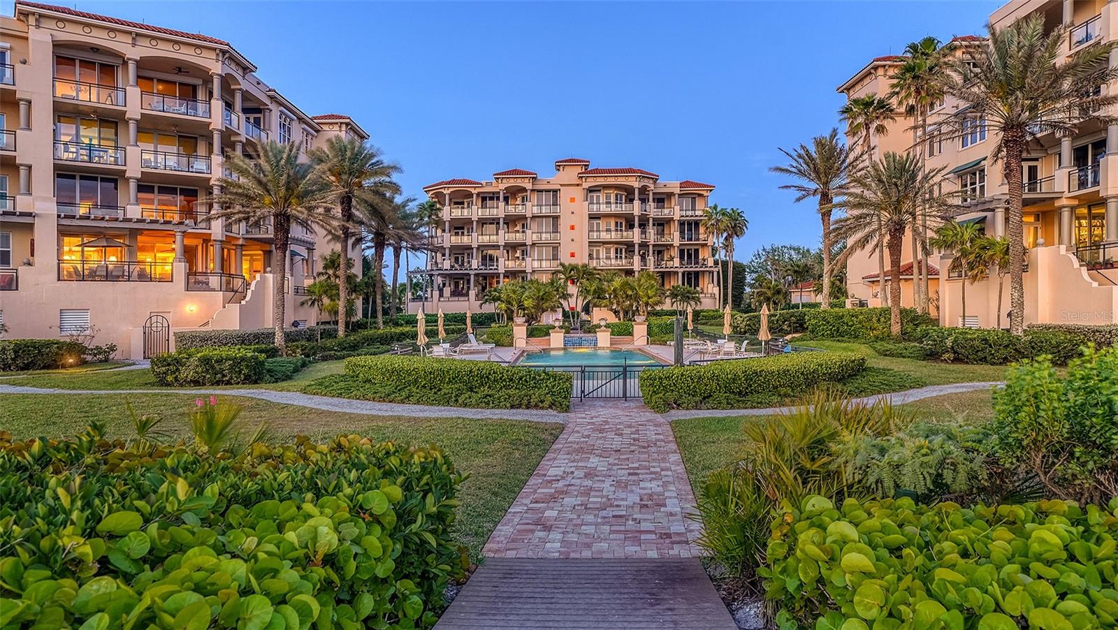 One or more photo(s) has been virtually staged. Some of the rooms and terrace are VIRTUALLY STAGED for the new Buyer's vision. A “Slice of Paradise” directly on the Gulf of Mexico is truly a challenge to find, however this residence on Longboat Key is one that is extraordinary and unique at the same time and a real “GEM” by the sea. An all-encompassing feel at Vizcaya is one of a Mediterranean theme with lush, immaculate landscaping of mature trees and privacy hedges. The generous living space has four large en-suite bedrooms; one of which is totally private across the private foyer for your extended family or can be used as a mother in- law suite. The feel of the interior is that of a single family home, with terraces extended from all of the bedrooms notwithstanding the enormous beachfront terrace that has your very own private, salt water pool, outdoor gas grill but ,most importantly, one of only a few residences on all of Longboat Key that has the added plunge pool feature and looks directly to the southwest over the Gulf of Mexico. The Manchurian maple floors throughout only enhance the beauty and warmth of the home. Put your “toes in the sand” at the beach which is in close proximity to your home as well as having the ability to access to your private oversized two car garage with an additional storage area directly below the home. A Chef’s dream can be found in the kitchen with an induction cook top, granite countertops, glass enclosure cabinets, sub- zero, a separate ice maker, wolf oven and Miele dishwasher. Hunter Douglas sheer shades are in the grand salon as well as Lutron lighting for a cozy atmosphere. For added enjoyment, Vizcaya has lovely amenities that include a tennis court, fitness center, social gathering area, catering kitchen, comfy sitting areas for relaxation, listening to the outdoor fountains or simply enjoy a morning of yoga in this space of solace. Vizcaya is one of those sought after communities with 24 hour guard gate security and just around the corner from the local Publix grocery store, CVS and minutes to St. Armands Circle for your shopping and dining experiences. To emphasize Vizcaya is one of those sought after communities is an understatement!! Be one of only 31 homeowners in this beautiful, “Boutique” community! It is truly luxury living at its BEST~