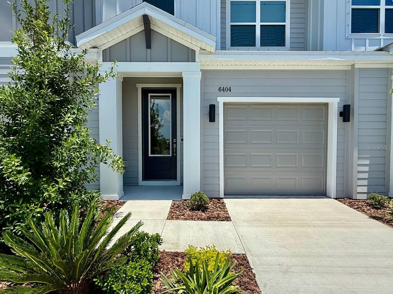 Be the first to live in this brand-new 3-bedroom, 2.5-bath townhome located in the highly desirable Waterset community. This bright and open home features a spacious living area, modern kitchen with stainless steel appliances, stylish finishes, and abundant natural light throughout. Upstairs, a versatile loft provides the perfect space for a home office, media room, playroom, or additional living area. The spacious primary suite includes a private bathroom, while two additional bedrooms offer flexibility for family, guests, or workspace needs. A washer and dryer are also included for added convenience. Waterset offers an exceptional selection of amenities, including community pools, a fitness center, clubhouse, basketball and tennis courts, a volleyball area, scenic trails, parks, and beautifully maintained common areas. Lawn maintenance is included in the monthly rent. Please note that GPS may direct visitors to the wrong side of Jensen View Avenue. The home is located on the side of the road with the newly constructed townhomes, where construction is still ongoing.
The home is also equipped with a security panel. Monitoring service is not included, but the resident may establish service independently if desired. In addition to the advertised base rent, all residents are enrolled in the Resident Benefits Package for $50 per month, which includes HVAC filter delivery, credit-building benefits, utility concierge service, and more. Additional details are available upon application.
Pets may be accepted at the owner’s discretion. Vacant and available now