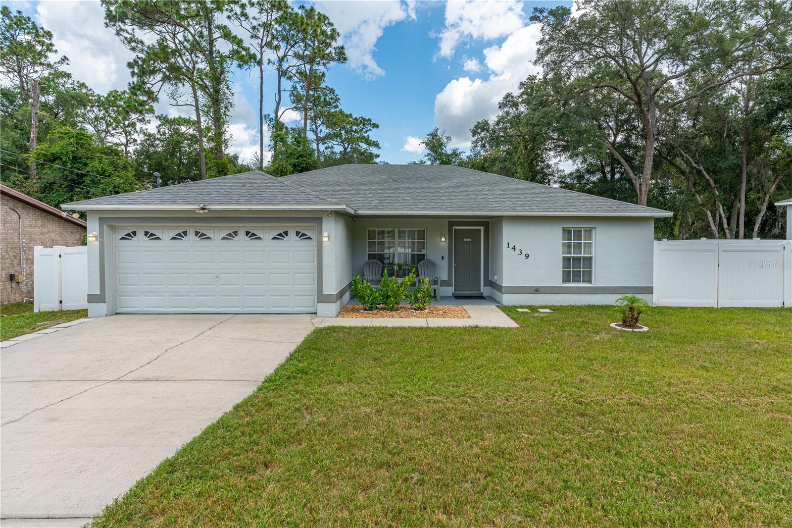 One of the strongest value opportunities on the market in Orange City today, this spacious, well-updated concrete block home offers a rare combination of affordability, condition, and long-term peace of mind. Thoughtfully maintained and move-in ready, the home features a **2024 HVAC system**, **2020 water heater**, and a roof that is only **4 years old**, providing major system upgrades that reduce future maintenance concerns. Paired with solid block construction, this is a home built for durability and efficiency. Inside, the desirable split-bedroom layout offers both privacy and functionality, while the open main living area and kitchen with stainless steel appliances create an easy flow for everyday living and entertaining. An interior laundry room adds convenience often missing in similar homes. The outdoor space is equally appealing, featuring a fully fenced vinyl backyard and a covered patio ideal for relaxing, grilling, or enjoying Florida evenings. The oversized lot provides

added flexibility for pets, gardening, or future enhancements.

One of the most unique financial advantages is the **private well and septic system**, eliminating monthly water and sewer bills while offering excellent water quality and long-term cost savings.

The location further elevates the value, just minutes from **Blue Spring State Park** and the **St. Johns River**, where residents enjoy kayaking, boating, fishing, hiking, and Florida's natural beauty. Convenient access to Downtown DeLand, shopping, dining, medical facilities, and I-4 makes commuting to Daytona Beach, Orlando, and surrounding areas simple and efficient.

Zoned for Volusia County schools, including **University High School**, this home sits in a growing and well-connected area that continues to attract strong demand.

Well maintained, strategically updated, and priced to stand out, this home delivers exceptional value in today's market.