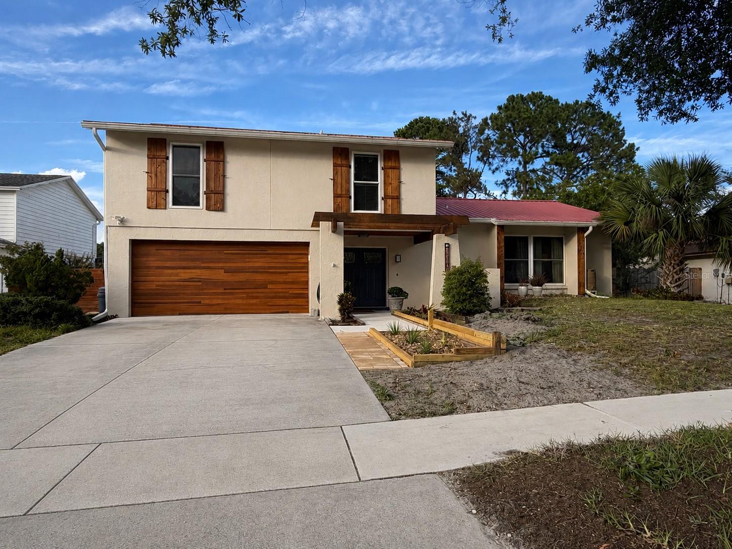 BEAUTIFULLY UPDATED 4-bedroom, 2.5-bath POOL HOME with 2,259 square feet of living space and a flexible floor plan. The REMODELED KITCHEN features modern cabinetry, newer stainless steel appliances, and a LARGE CENTER ISLAND, while the UPDATED PRIMARY SUITE offers a spa-inspired bath with dual vanities and a walk-in shower. Enjoy Florida living year-round from the SCREENED LANAI overlooking the SPARKLING SALTWATER POOL, expansive patio, and FULLY FENCED backyard. Additional highlights include NEW LUXURY VINYL FLOORING, FRESH INTERIOR PAINT THROUGHOUT, UPDATED BATHROOMS, a METAL ROOF (2006), HYBRID WATER HEATER (2023), WATER SOFTENER (2025), NEW GARAGE DOOR, and NO HOA OR CDD FEES. Just minutes from shopping, dining, schools, parks, and Tampa Airport. 30 minutes to major FL attractions like Busch Gardens, Adventure Island, and Gulf Coast beaches. 90 minutes from Disney & Universal.