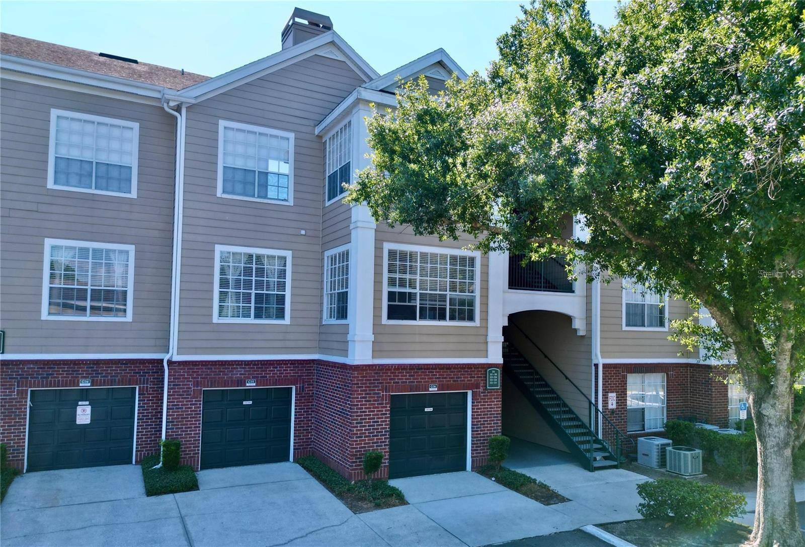 Beautifully updated 2-bedroom, 2-bath condo located in the desirable Plantation Park Private Residence community near Lake Buena Vista. This bright third-floor unit offers an open and comfortable layout with high ceilings, oversized windows, a cozy living room fireplace, built-in shelving, and a fully equipped kitchen with stainless steel appliances, ample cabinet space, and a breakfast bar overlooking the living area. The property was recently improved with new vinyl flooring, new light fixtures, and new ceiling fans, giving the home a fresh and modern feel. Both bedrooms are spacious and feature generous closet space, and the in-unit laundry room adds everyday convenience. Parking is available for 2 vehicles. Enjoy resort-style community amenities including a pool, spa, clubhouse, fitness center, tennis courts, racquetball court, playground, picnic areas, and beautifully maintained grounds. Excellent location just minutes from Walt Disney World, SeaWorld, Universal Orlando, Orlando Premium Outlets, shopping, dining, and major highways including I-4. Pets welcome, subject to approval, pet deposit. Ready for comfortable Central Florida living.