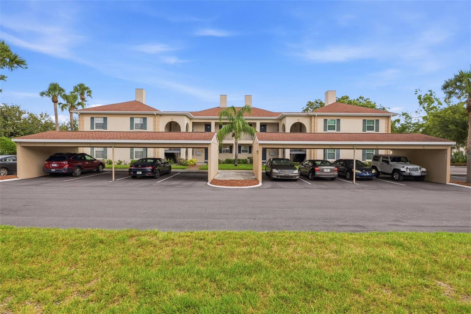 Welcome to this beautifully updated first-floor condo in the highly desirable community of The Grand at Olde Carrollwood. This spacious 1-bedroom, 1-bath end unit features tile flooring throughout, stainless steel appliances, granite countertops, recessed lighting, an updated walk-in shower, and hurricane-impact windows. The HVAC and water heater are approximately 5 years old, offering added peace of mind. An enclosed Florida room expands your living space, and the open-concept floor plan provides flexibility—easily converted back to a 2-bedroom layout if desired. With an acceptable offer, the seller is willing to include a home warranty valued up to $500. Ideally located directly across from the clubhouse, this unit offers exceptional convenience. Community amenities include two swimming pools, tennis courts, a fitness center, business center, valet trash service, and an on-site manager. The association maintains fully funded reserves, ensuring long-term financial stability. Situated in the heart of Old Carrollwood, this prime location is walking distance to Publix, Starbucks, and local shops, and just minutes from restaurants, major highways, hospitals, and Tampa International Airport.
A fantastic opportunity to own in one of Carrollwood’s most sought-after communities.