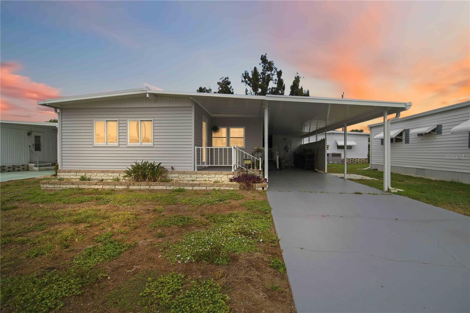 TURNKEY and beautifully remodeled for just $160,000 — an exceptional opportunity in one of Bradenton's most desirable 55+ communities. Simply bring your clothes, unpack, and start enjoying the Florida lifestyle from day one.

Welcome to 5316 Chateau Lane in Chateau Village, where comfort, convenience, and value come together. This meticulously maintained home has been thoughtfully updated with new electrical service to the home, a new electrical panel, updated windows, new vinyl siding, and a durable rubber roof, giving you peace of mind for years to come.

Step inside and you'll immediately appreciate the bright, open feel and modern finishes throughout. The beautifully updated kitchen serves as the heart of the home, featuring a granite-topped island, custom cabinetry, and newer appliances that make entertaining family and friends effortless. Luxury vinyl flooring flows throughout the residence, while both bathrooms have been tastefully remodeled with stylish, contemporary fixtures. An inside washer and dryer adds everyday convenience and functionality.

One of the best parts? This home is located in a non-flood zone, helping provide additional peace of mind. Low HOA fees of just $250 per month make ownership affordable while allowing you to enjoy all the benefits of this well-maintained community.

The location is hard to beat. You're minutes from shopping at Publix, Walmart Supercenter, ALDI, and Detwiler's Farm Market, with excellent healthcare nearby including HCA Florida Blake Hospital and Manatee Memorial Hospital. Public transportation is easily accessible through Manatee County Area Transit, making it convenient to get around town.

Enjoy quick access to major roadways including US-41, US-301, SR-70, and Interstate 75, connecting you to nearby destinations such as Sarasota, Palmetto, Lakewood Ranch, Ellenton, Venice, and St. Petersburg. When it's time to enjoy the Florida sunshine, you're just a short drive from the world-famous beaches of Anna Maria Island, Holmes Beach, Bradenton Beach, Coquina Beach, and the sparkling waters of the Gulf Coast.

Whether you're searching for a full-time residence, winter getaway, or low-maintenance Florida retreat, this move-in-ready home delivers exceptional value, beautiful updates, and an unbeatable location. Opportunities like this at $160,000 don't last long—schedule your showing today before someone else beats you to it.