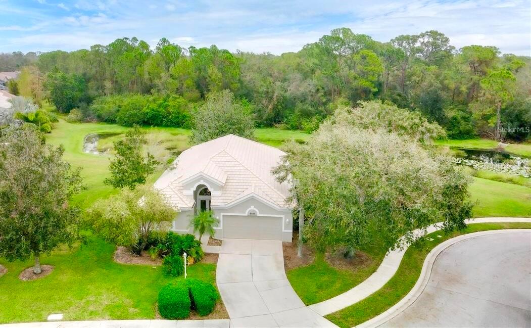 PRIVACY!!! Located on one of the most desirable and private lots in the center of one of the nations most sought after communities, Lakewood Ranch, this fully renovated home offers a thoughtfully redesigned open floor plan completed in April 2025. This property sits on a 1/4 acre lot at the end of a quiet cul-de-sac with a unique plot that provides complete privacy set away from surrounding neighbors which is exceedingly difficult to find. With 3 bedrooms, 2 bathrooms, and a separate office or den, the layout is both functional and flexible for today’s lifestyles.

Inside, the home features modern finishes, a spacious living area, elevated ceilings and a brand-new HVAC system for year-round comfort and efficiency. The open-concept design allows for natural light throughout the main living spaces, creating a welcoming and versatile environment. One of the most charming aspects of this property are the serene views overlooking your own preserve with tons of wildlife which can be seen from your living room, master bedroom and kitchen! 

This home underwent a top to bottom interior renovation. Some of the highlights of this newly refined home include new upgraded solid wood cabinetry, premium light oak LVP waterproof flooring, premium quartz countertops throughout, brand new 3.5 ton Carrier HVAC system, plantation shutters, all new trim, full interior paint including ceilings, all new hardware, new fans throughout, new screened lanai, 2 fully renovated bathrooms and much more. 

This is a must see home in Edgewater Village: a gated, maintenance-free community offering a clubhouse with heated pool, scenic walking trails, and charming gazebo with a pier—great for fishing, kayaking, canoeing, or simply enjoying the sunsets. Conveniently located near UTC Mall with its array of dining and shopping options, Sarasota International Airport, medical facilities, theatersh, and the world-renowned Gulf Coast beaches, this home offers the perfect combination of tranquility and accessibility.