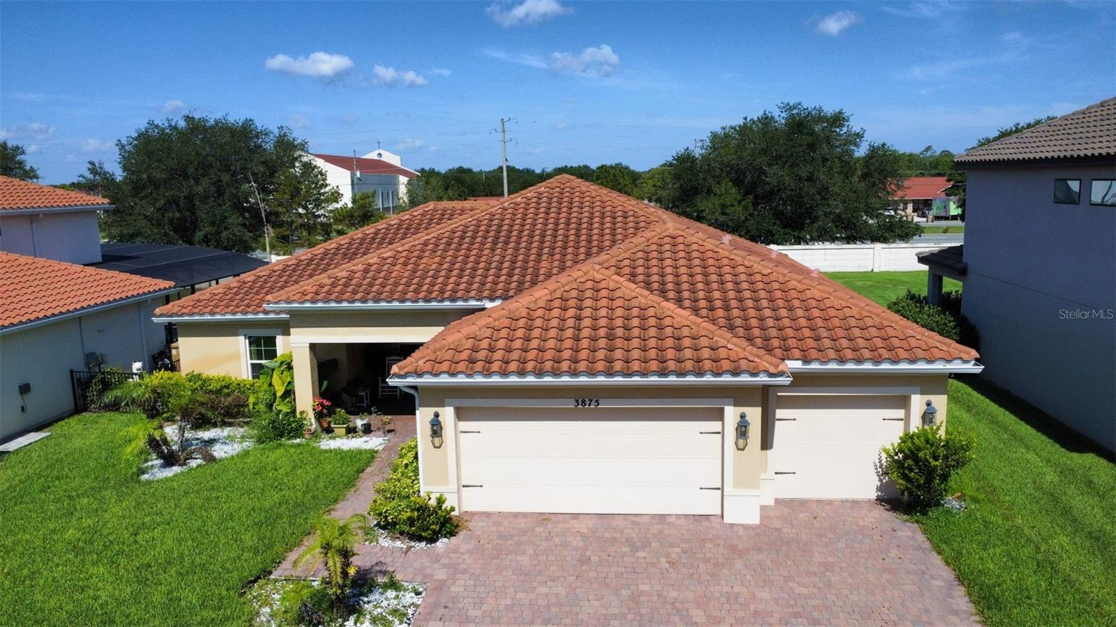 Discover this beautiful 4-bedroom, 2-bath, 3 car garage home located in the highly desirable Bellalago community, offering resort-style living with unmatched amenities. This spacious property features a large backyard, a back porch and balcony perfect for relaxing and enjoying Florida sunsets. Inside, the home offers generous living areas designed for comfort and functionality. The master bedroom is spacious and features a large walk-in closet, dual vanities, and shower. Ceramic tile flooring runs throughout the home except in the bedrooms which are carpeted. Bellalago residents enjoy exclusive access to a private boat ramp and marina on Lake Tohopekaliga, ideal for boating and fishing enthusiasts. The community also includes two stunning clubhouses, multiple pools, water parks, state-of-the-art fitness centers, sports courts, walking trails, and 24-hour gated security. Residents have convenient access to supermarkets and several dining establishments. Experience the perfect blend of lifestyle, space, and convenience in one of Kissimmee’s most sought-after lakefront communities.