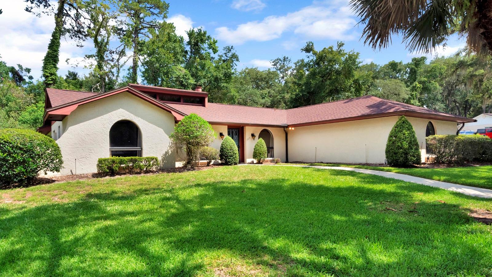 FANTASTIC OPPORTUNITY IN SWEETWATER OAKS! Nestled under a canopy of mature trees in one of Longwood’s premier neighborhoods, this pristine 4-bedroom, 2-bathroom pool residence flawlessly showcases true pride of ownership!  Exceptionally maintained: ROOF 2016, REPIPED w/PEX, NEWER ELECTRICAL PANEL & OUTLETS, REMODELED KITCHEN AND BATHS, NEWER GARAGE DOOR and Freshly Painted Pool Decking! PERFECT for both everyday living and grand-scale entertaining, the traditional floor plan offers a seamless flow, featuring spacious living areas, neutral decor throughout, soaring ceilings, a welcoming atmosphere, inviting wood burning fireplace and beautiful architectural touches! GOURMET kitchen with granite counters, convenient pass through window to patio, ample cabinets and SS appliance package (3 yrs new!).  The heart of the home effortlessly transitions to a private backyard oasis with spacious covered patio and sparkling screen-enclosed pool serving as your personal Florida retreat.  Enjoy the fenced in dog run/pet area with your 4 leg best friend(s).  Home boasts a generous size corner lot at .32 acres with definite curb appeal along with convenient side facing garage and utility door access to garage! Beyond the property line lies the unparalleled lifestyle of Sweetwater Oaks, giving you exclusive access to the private Sweetwater Beach on Lake Brantley (for boating and skiing), tennis, playground/picnic area and Riverbend Park’s kayak launches onto the Wekiva River. Complete with top-tier Seminole County schools including Sabal Point Elementary, Rock Lake Middle, and Lake Brantley High, this MOVE-IN-READY gem offers the ultimate blend of timeless comfort and luxury community living. Incredible Longwood location with easy access to 434, 436, I4 plus close to multiple Publix, schools, shopping, dining, Wekiva Island, Wekiwa Springs Park, Uptown Altamonte, Orlando Health, Advent Health and so MUCH MORE!