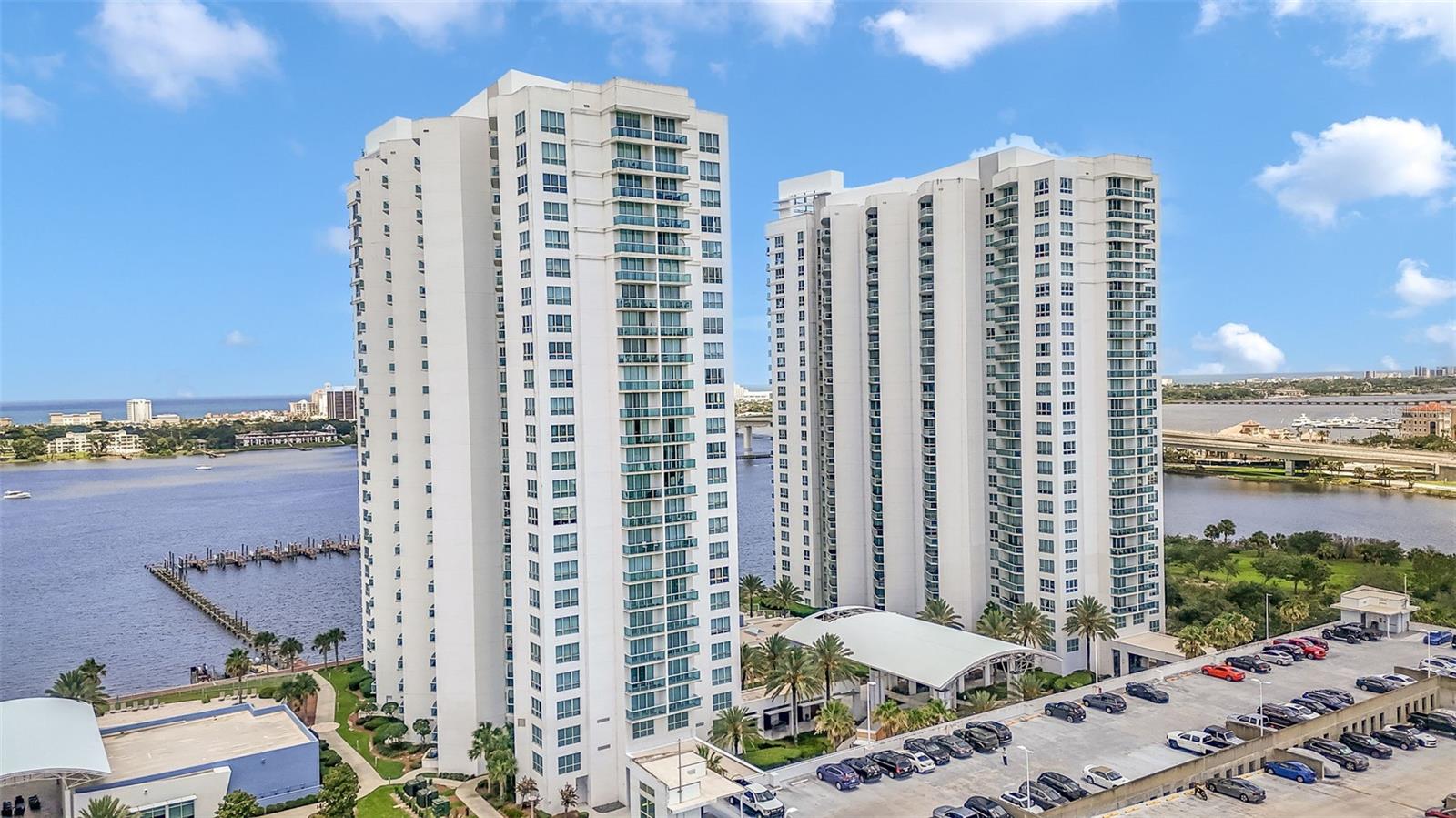 Experience breathtaking panoramic views from what was originally the model residence in one of the area's premier waterfront condominium communities. Perched on the 18th floor, this exceptional 2-bedroom, 2-bath residence offers unobstructed views of both the Atlantic Ocean and the Intracoastal Waterway from every room, creating a truly unmatched living experience.
Designed to maximize its incredible location, the spacious open-concept floor plan is filled with natural light and showcases spectacular sunrises over the ocean and stunning sunsets across the Intracoastal. The primary suite enjoys the same incredible water views, offering a peaceful retreat with an ensuite bath and generous closet space. The guest bedroom is equally impressive, providing guests with the same captivating waterfront scenery.
Step onto the private balcony and take in miles of coastline, sparkling waterways, passing boats, and the vibrant city skyline. Whether enjoying your morning coffee or relaxing in the evening, the views are simply unforgettable.
Residents enjoy resort-style amenities including multiple swimming pools, fitness center, theater, game rooms, steam rooms, clubhouse, conference room, gated entry, and on-site security. Conveniently located just minutes from the beach, shopping, restaurants, entertainment, and easy access to I-95, this residence offers the perfect blend of luxury, convenience, and waterfront living.
A rare opportunity to own one of the building's most desirable units with arguably the best views in the entire community.
