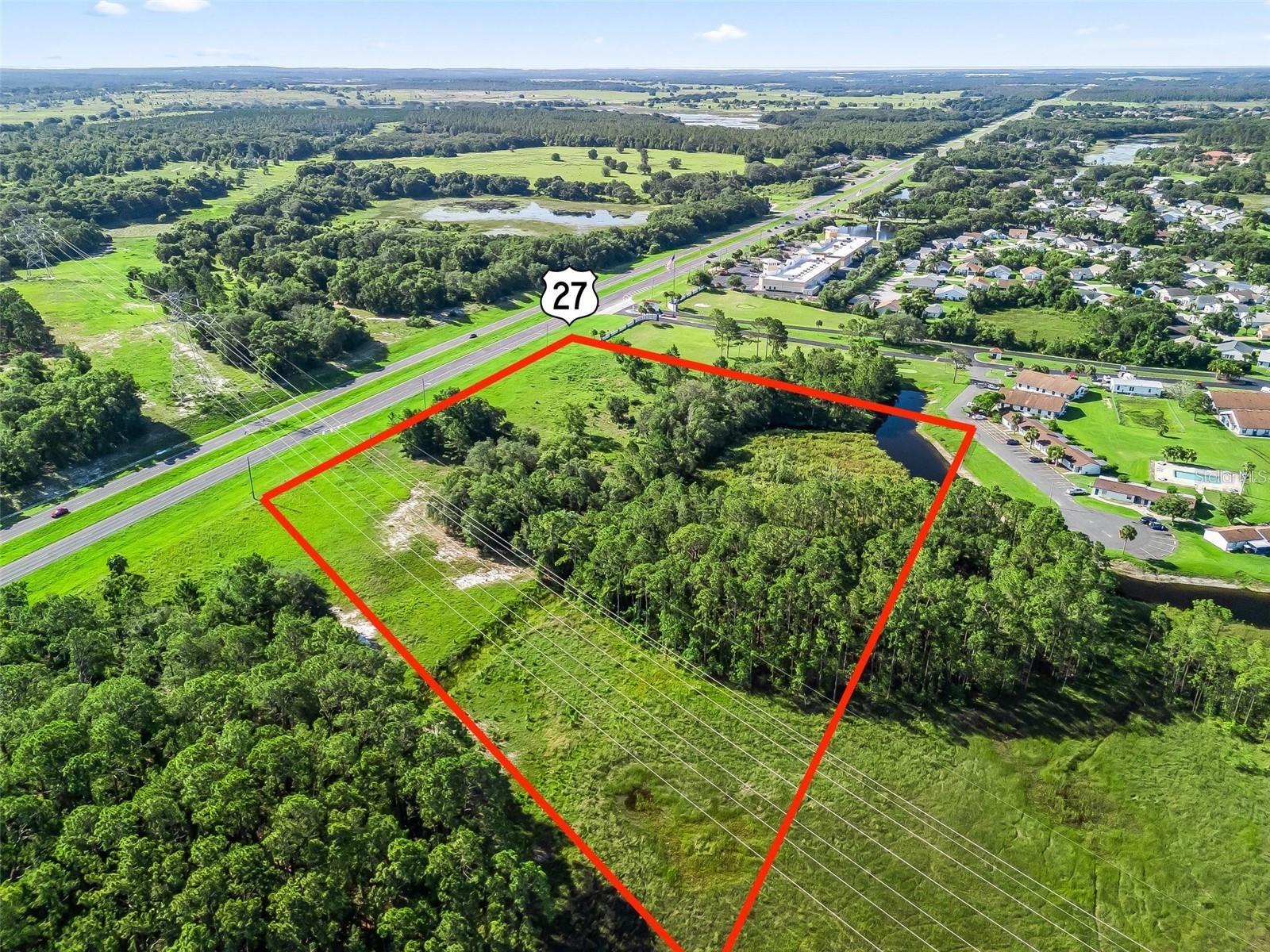 5.75-acre development site on US Highway 27 in Leesburg, with preliminary approval for a 130,200 SF ministorage facility totaling 571 units. A contractor is available to build out the project at $10,500,000.

This undeveloped, zoned parcel offers roughly 400 feet of highway frontage, giving it strong visibility and easy access along a high-traffic corridor. Located just minutes from downtown Leesburg and nearby highway connections, the site sits amid an expanding mix of residential neighborhoods, retail, and service businesses — supporting commercial, residential, or mixed-use development, subject to zoning and permitting. 

A clean, undeveloped tract like this is increasingly hard to find in this corridor. Well suited for developers, investors, or end users looking to build in one of Central Florida's fastest-growing markets. PERMITTED & READY TO START CONSTRUCTION.
