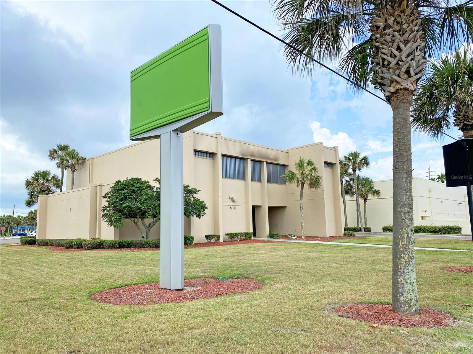 Freestanding Building Currently Leased consists of 44,050 square feet, highly visible and identifiable location in beachside market in New Smyrna Beach. With Teller Windows, Open Cubicle Area, Perimeter Offices, Large Open Training Room, Break Room, Restrooms and Supply Closet. Pylon Signage. 33 Parking spaces and Drive-Thru Canopy. Storm Panels For Windows. Zoned B2 Neighborhood Business District with Many Allowable Uses. Easy Ingress and Egress. Easy walking distance from tourist accommodations: Hotel, Condos and Short term rentals. Situated Directly Across From 3rd Avenue Beach Access Approach. Incredible Location with Excellent Access from East 3rd Ave/Hwy A1A. Across from Village Shopping Mall: Publix, Bealls, Restaurants, Retails and more... High traffic count with approximately 32,000 ADDT combined on Hwy A1A/3rd Ave and S Atlantic Ave. ;Water: Available at Site