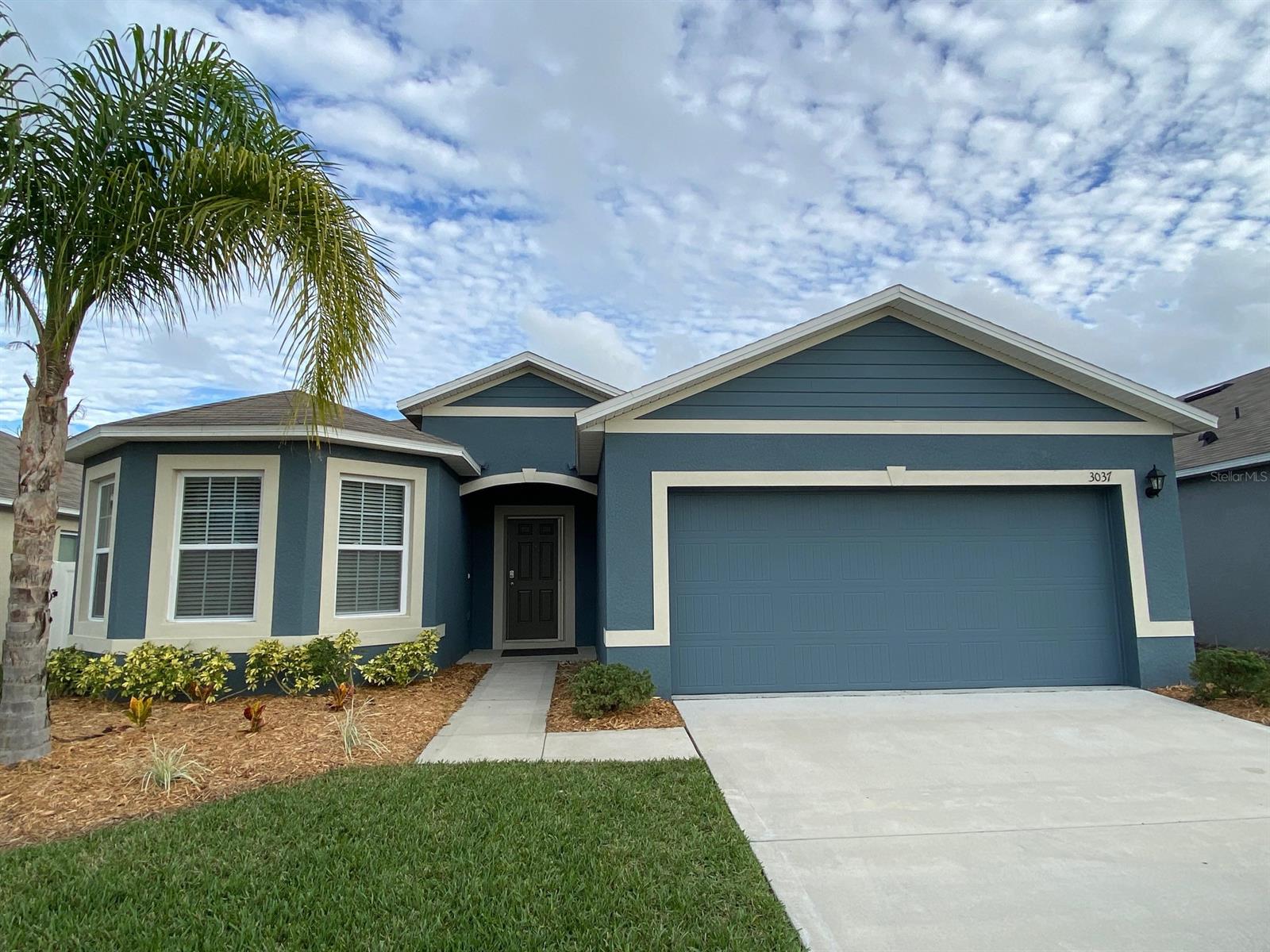 Check out this beautifully 3 bedroom 2 bathroom 2 car garage home located Coastal Woods Community in New Smyrna Beach! This home has a very spacious open floor plan great for entertaining. You have a private fenced back yard with a conservation view! The Kitchen features an eat-in Dinette overlooking the front garden. There is tile flooring in the kitchen and vinyl flooring in the living room & bedrooms. There is a living room and dining room combo and a split bedroom floorplan. Inside laundry room right off the garage. The master suite features a walk-in closet. Enjoy your time at home, community pool, playground & pickleball courts! Great located less than 6 miles from the beach with easy access to I-95 and downtown New Smyrna Beach where you can go shopping, dining, and lot's of entertainment options.