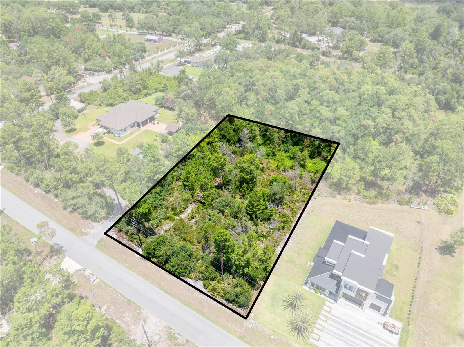 Build the home you've always envisioned on this expansive 1.17-acre homesite in a highly sought-after Central Florida location. Tucked away while still offering easy access to Lake Nona, Orlando International Airport, top-rated dining, entertainment, and everyday conveniences, this property provides the perfect balance of privacy and accessibility. With no HOA and no required timeline for construction, you have the flexibility to create your ideal home whenever you're ready. Opportunities like this are becoming increasingly scarce in such a fast-growing area. Don't miss your chance to secure this exceptional piece of land, and come check it out today!