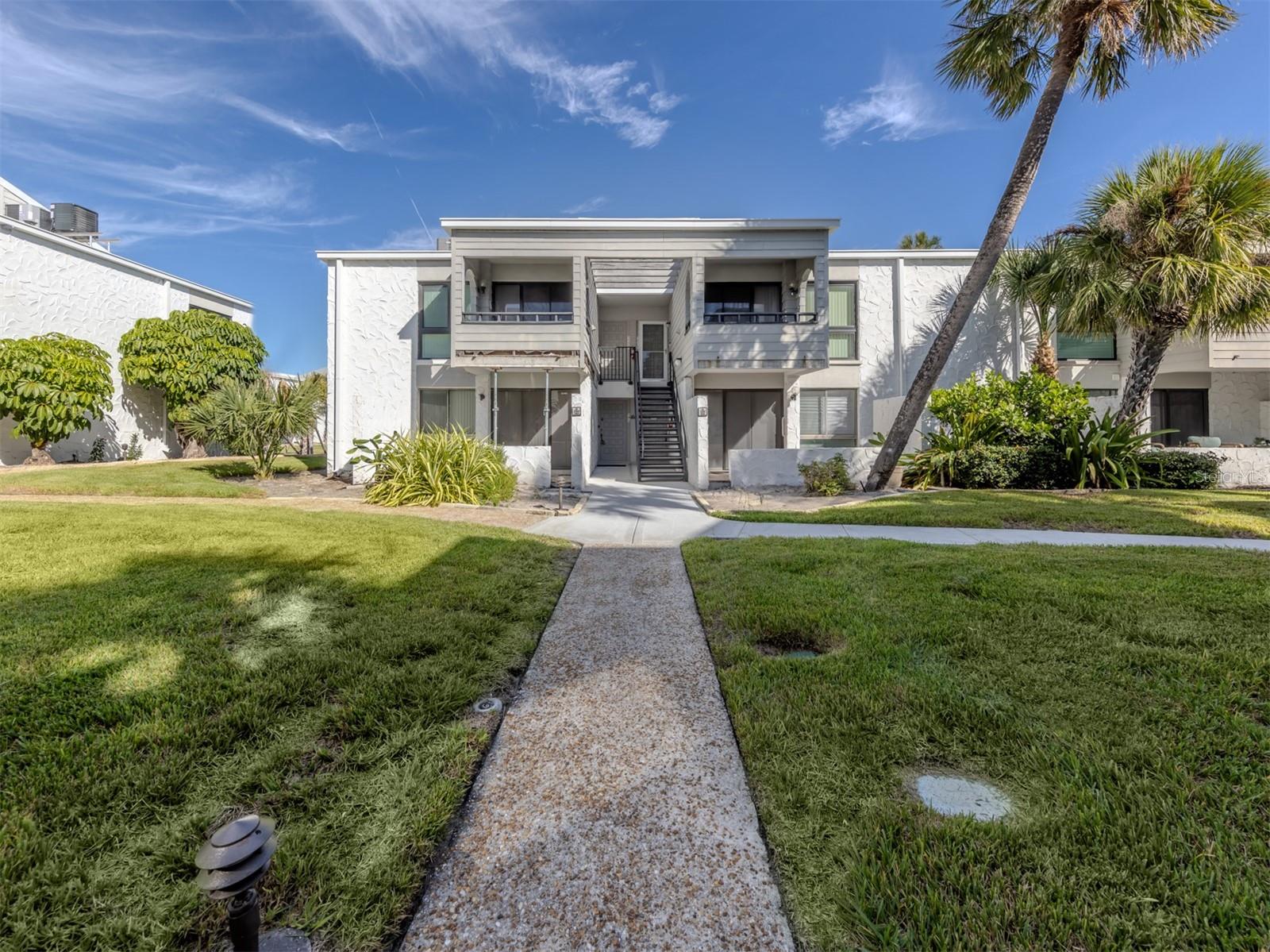 A price adjustment has been credited to this fully furnished condo, $20,000.00 is a nice reduction. Great condominium and an even better location in Bahia Vista Gulf. First floor, good parking spot, short distance by the new sidewalk to your front door. Your condominium is near beautiful Venice beach and the newly renovated BVG Gulf-side pool. New pavers everywhere, new furniture around the multiple decks surrounding a resort setting, a great place to meet new friends and catch up with old friends, soak up the sun, enjoy a book game of cards you name it. This is the place to be. This condominium has been recently renovated with new floors and furniture that is included. The great room has a comfortable sectional that cleverly converts to a queen bed.  You can easily sleep six in this lovely condominium. The primary bedroom is spacious and has a walk-in closet with a hidden surprise. Your washer and dryer are installed in there and vented from the outside wall. Guest bedroom has a trundle bed that opens to accommodate two sleepers, the newly renovated bath is just a short distance from the trundle. The kitchen has granite countertops, a ton of workspace and a wine refrigerator, white cabinets always feel like Florida and make the kitchen bright and beachy. The kitchen slider will take you out to a second patio to enjoy the Gulf breezes. You have choices for sure, but this complex will not disappoint. The public beach is close by, the Crow's Nest restaurant is across the street, shopping, entertainment and more restaurants are just a short walk to beautiful downtown Venice. This condominium will not be available from February 1 through April 15, 2027, for a returning renter. So here is a rental income for 2027 as well. But there's plenty of time until then to make it your getaway.