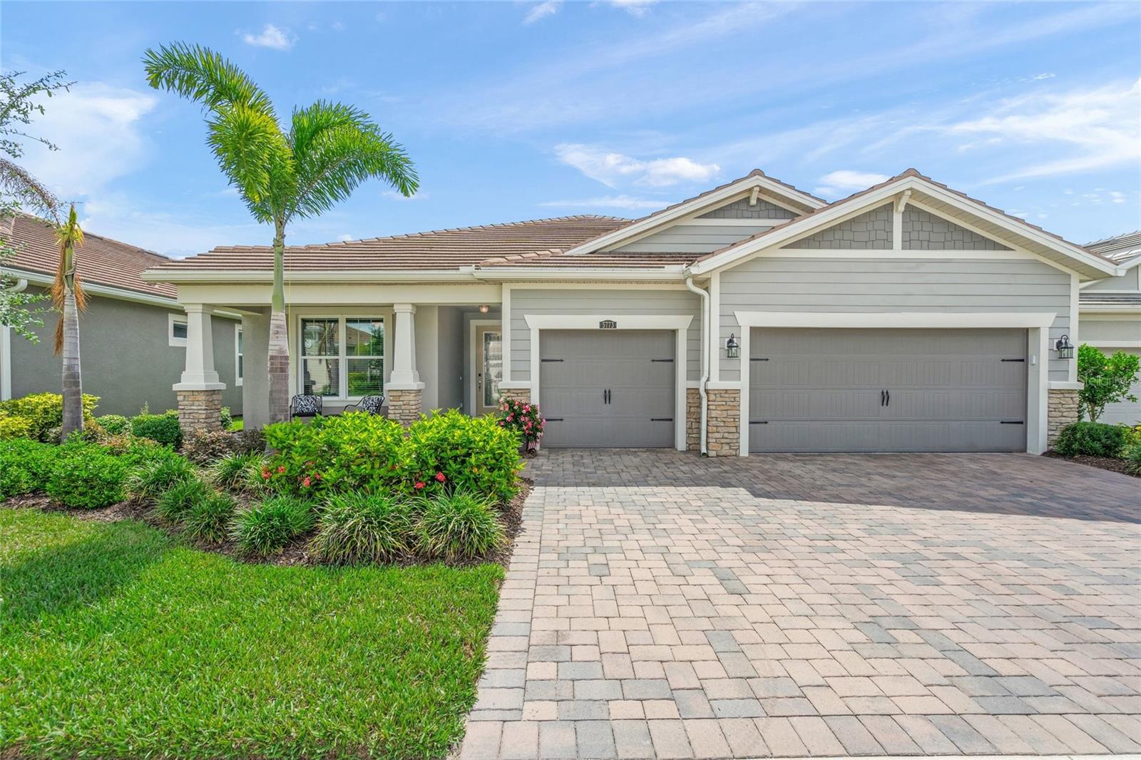 Built in 2022, this stunning 2,626 sq. ft. residence (Jubilee Model) offers 3 bedrooms + office, 3 bathrooms, and a 3-car garage, all perfectly positioned to capture beautiful, private water views. Designed with both comfort and entertaining in mind, the large great room serves as the centerpiece of the home and seamlessly connects to the kitchen and dining areas. The upgraded kitchen overlooks these spacious entertaining areas and is a standout feature with upgraded white cabinetry with end panels, an executive kitchen layout with wall ovens and range hood, undercabinet lighting, and a contrasting island with dark cabinetry for added style and sophistication. Perfect for gatherings, the dining area just off the kitchen can easily accommodate dining arrangements of any size.  The front guest bedroom is filled with natural light and features its own en suite bathroom, creating the perfect retreat for visitors. The spacious office/den at the rear of the home also enjoys abundant natural light and sliding glass doors overlooking the oversized paver lanai and serene backyard setting. The spacious primary suite is designed for comfort and relaxation, featuring large windows that bring in beautiful natural light along with an adjoining luxurious bathroom complete with separate vanities, a linen closet, glass door shower, and an enormous walk-in closet. The third bedroom offers privacy for guests and is conveniently located near the remaining full bathroom.  Additional highlights include luxury vinyl flooring throughout with NO carpet, elegant crown molding, IMPACT windows and doors, garage hanging racks for additional storage and beautiful epoxy floors, and a spacious pantry complete with counters and shelving for exceptional organization. The oversized three-car garage features epoxy flooring for durability and easy maintenance. This thoughtfully designed home combines modern finishes, practical upgrades, and peaceful waterfront living. The low monthly HOA fee covers grounds maintenance, irrigation, and access to Sunrise Preserve’s outstanding amenities, including a resort-style pool, clubhouse, tennis, pickleball, bocce ball courts, and more. Ideally located near shopping, dining, beautiful Gulf beaches, and I-75—and situated within an excellent school district—this home truly offers the best of Florida living. Don’t miss your opportunity to make it yours!
