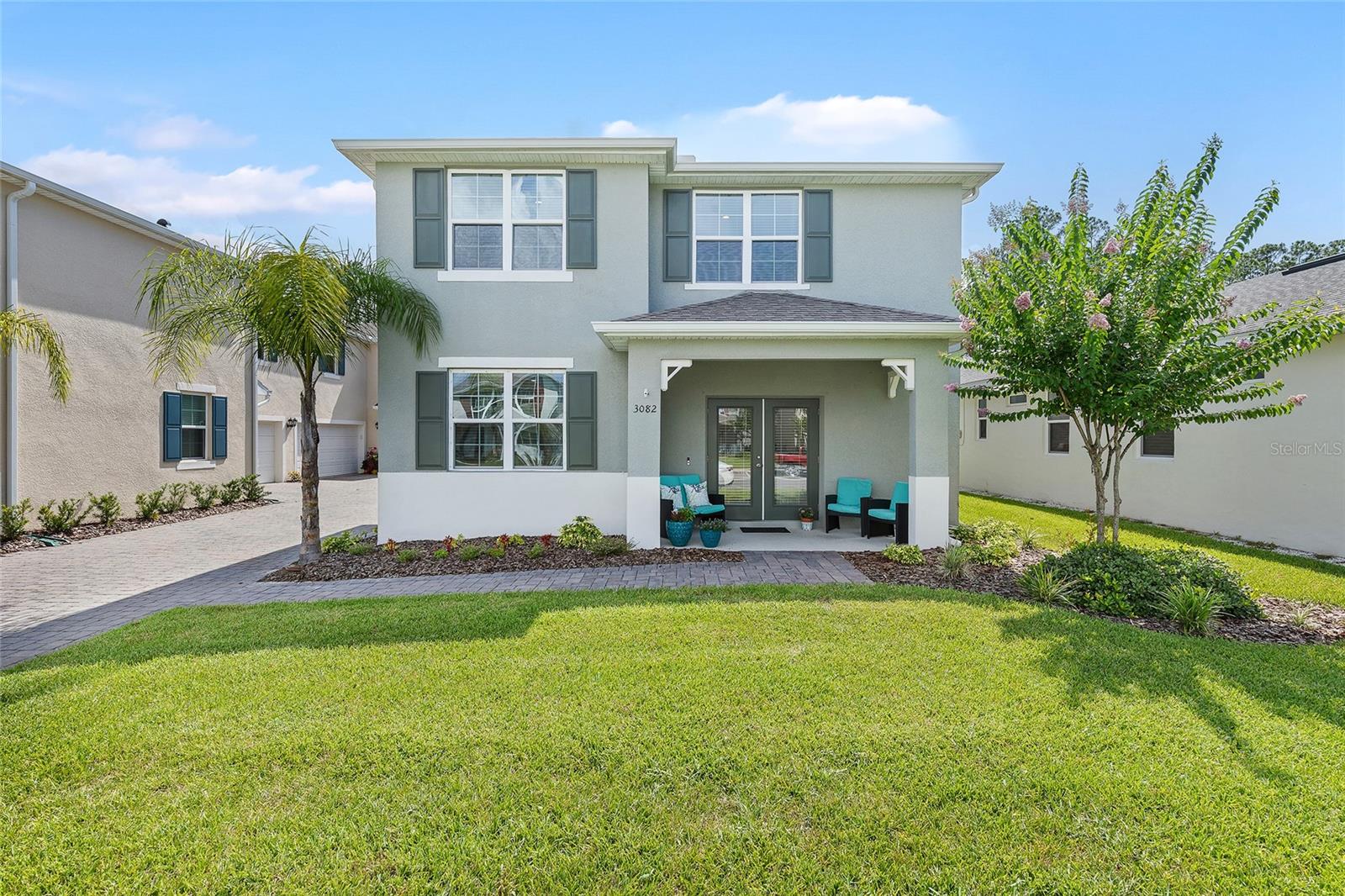 Experience the best of coastal living, just minutes from the drivable white sand beaches of New Smyrna!!! Vibrant art galleries, charming boutiques and renowned dining create an unmatched lifestyle. Welcome to The Palms in Venetian Bay....this seaside inspired meticulously kept home has 3 large bedrooms, 2.5 bathrooms and an oversized 2 car garage. This spacious townhome has an open floor plan which includes an expansive kitchen, with a large center island with seating for 4 easily. Featuring gleaming white wood cabinets, granite countertops, stainless steel appliances including the washer and dryer which are like new. French doors lead to the darling porch, which faces east, so you do not get the blazing sun in the afternoons. So many upgrades have been done, beautiful shiplap wall, white crown molding in the entire first floor. The kitchen backsplash has been tiled to match the painted feature wall in the living room. The beachy beaded chandelier comes from a chic furniture store and is a soft sea green, continuing the seaside feel to the home. Upstairs the primary suite feels like a private retreat with a walk in closet, double sink vanity and granite countertops. The 2 additional bedrooms have plenty of natural light and share another full bathroom. The half bath located om the first floor is super convenient for easy access. Venetian Bay has miles of walking trails, is golf-cart friendly and has multiple great restaurants close by. The town square has a boutique style grocery store, a world class Spa at Venetian Bay, Bistro 424 for fabulous food and drinks. Living in The Palms, very close by is a "membership only" resort style pool you can join. The Tiki Bar and restaurant at the pool features live music and great cocktails! So you golf?! Golf enthusiasts will love this 18 hole-championship golf course and clubhouse, which had delish food and ice cold beer.... Fore!! Close by is 2 distinct districts. Historic Canal Street with art show, Pink Flamingo at Petals Florist shop, tons of fab restaurants like for pizza head to Prima. Oysters...must go to The Pearl, so may outstanding dining and shopping choices. Ready for some sun and sand?! Head to Flagler Avenue for lively bars, restaurants featured on Guy Fieri's Diners, Drive-Ins and Dives...The Garlic, Third Wave and voted nearly best burger every year The Breakers! So come for the best lifestyle, chic seaside living and a gorgeous home to relax and enjoy. Do not miss this home!!!