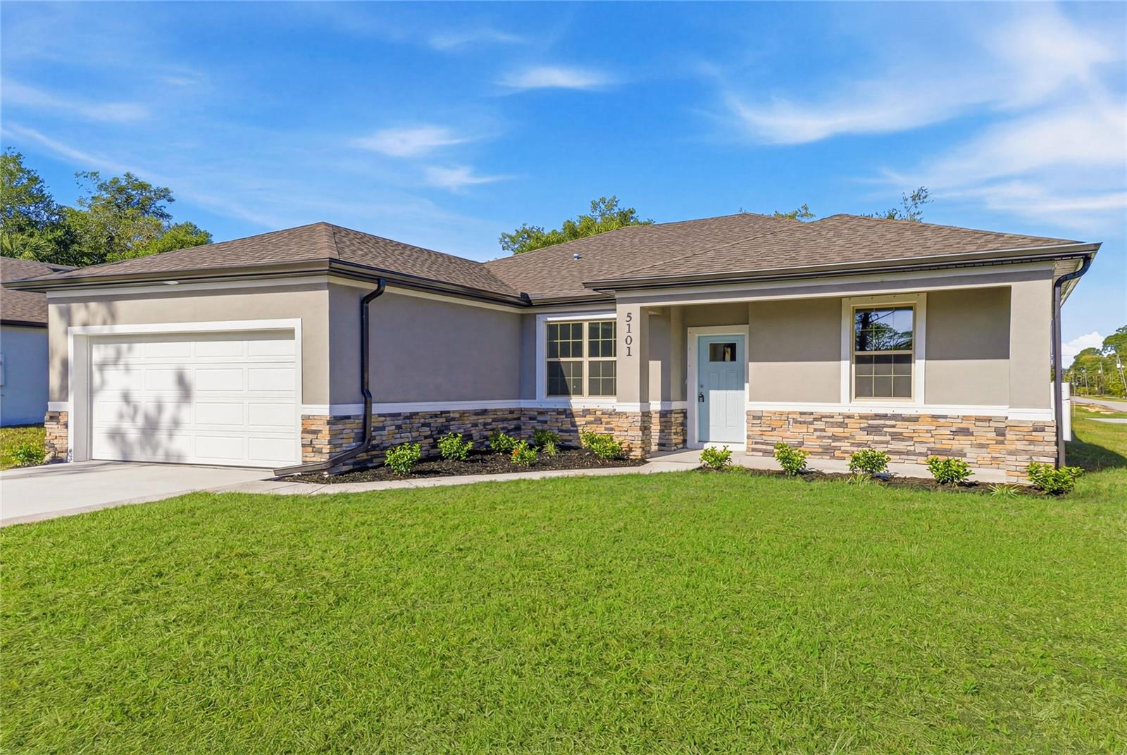 Now offering 3% TOWARDS CLOSING COSTS WITH PREFERRED LENDER.  Great price with luxury features and ready now! A newly constructed home with city water and septic system in North Port, with no HOA fees! Great location for quick access to schools, the city center, medical conveniences, parks and the highway. This affordable new home is ready for you and is just what you've been looking for! This home has 9'4" tall ceilings, a nice and open layout with a versatile floor plan. The house features 4 bedrooms, 2 full bathrooms, dining room, a living room, an open kitchen and a 2-car garage with 1810 square feet of living space. The living space is well utilized with high ceilings and many windows providing natural light. The interior features will provide you with the quality and luxury you were looking for in your new home. This home has a split floor plan with the primary suite on one side of the home and the guest bedrooms on the other. The primary bedroom has a tray ceiling and large windows that let in natural light. You'll also enjoy a resort-style bathroom with a spacious walk-in shower with floor-to-ceiling tiled walls and a glass enclosure. It also features a linen closet, double vanity and a large walk-in closet. The living room features large windows and several LED fixtures providing plenty of light with access to the covered lanai. The living room is open to the kitchen, where you'll find a huge center island with extra seating for casual dining and plenty of cabinets. The kitchen features stainless steel appliances, Shaker-style cabinets with crown molding, decorative hardware, subway tile backsplash and granite countertops. The dining room is located at the front of the house, with large windows allowing for plenty of natural light. The home includes luxury vinyl plank flooring in the main living areas and bathrooms for durability and comfort. You'll love these floors! They are easy to maintain and offer a modern design, perfect for new homes. Other features include the same beautiful Shaker-style cabinets with hardware and granite countertops in the bathrooms, 5-inch baseboards, a garage door opener, gutters on the exterior, R38 insulation, a 16 SEER HVAC and much more. Visit our model center and compare the features and quality with other homes and you'll see the difference. We make buying easy for you!