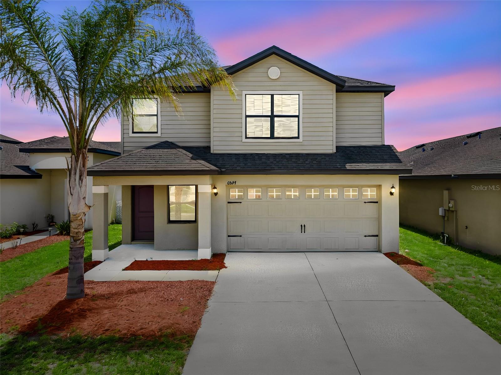 Searching for a move-in ready 4-bed home in Lakeland with modern finishes, resort-style amenities, and convenient access to both Tampa and Orlando? Welcome to 6547 Baikal Place, a beautifully maintained single-family residence located within the highly desirable Villages at Bridgewater community. Built in 2019, this 4-bedroom, 2.5-bathroom home offers 1,823 square feet of thoughtfully designed living space that balances comfort, functionality, and style. The open-concept floor plan creates seamless flow between the living, dining, and kitchen areas, making it ideal for both everyday living and entertaining. The kitchen serves as the heart of the home and features granite countertops, a center island, 42-inch cabinetry, and a full stainless steel appliance package including a range, microwave, refrigerator, and dishwasher. Tile flooring enhances the main living areas while plush carpeting adds comfort to the bedrooms. Recent updates include the kitchen and bathrooms, and the roof, HVAC system, and water heater are all approximately seven years old, providing added peace of mind. The spacious layout includes four bedrooms and two and a half bathrooms, offering flexibility for guests, hobbies, work-from-home needs, or growing households. Outside, a two-car garage and private driveway provide ample parking and storage. Residents of Villages at Bridgewater enjoy access to an impressive collection of amenities including a resort-style pool, fitness center, clubhouse, tennis courts, basketball courts, playgrounds, walking trails, private fishing dock, canoe launch, and scenic lakes throughout the community. Conveniently located near SR-33 and Interstate 4, this home provides quick access to Tampa, Orlando, major employment corridors, shopping, dining, and entertainment. Nearby destinations include Historic Downtown Lakeland, Lake Parker Park, Common Ground Park, Florida Southern College, Safari Wilderness, and a variety of local restaurants and retail centers. Combining modern upgrades, desirable community amenities, and a prime North Lakeland location, this property presents an outstanding opportunity to enjoy the best of Central Florida living.