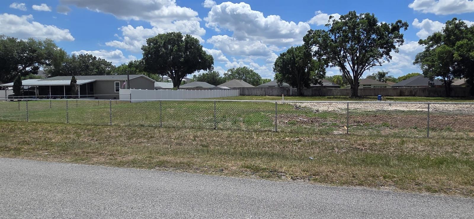 Build your dream home—or two!—on this beautiful 1.25-acre parcel of buildable land in the highly desirable Angus Valley community of Wesley Chapel. Located in Flood Zone X, this high-and-dry property provides incredible flexibility, allowing for a maximum of two dwelling units on the property. Whether you're planning a multi-generational living arrangement or exploring investment potential, this parcel presents a unique possibility. City water is available, and an existing well and septic system are already on-site, providing added value and potential savings. Enjoy the tranquility of a natural setting while remaining just minutes from premier shopping, dining, schools, and everyday conveniences. Conveniently located near I-75 with easy access to Tampa and everything Wesley Chapel has to enjoy. Don't miss this rare chance to own 1.25 acres in one of Pasco County's most desirable areas.