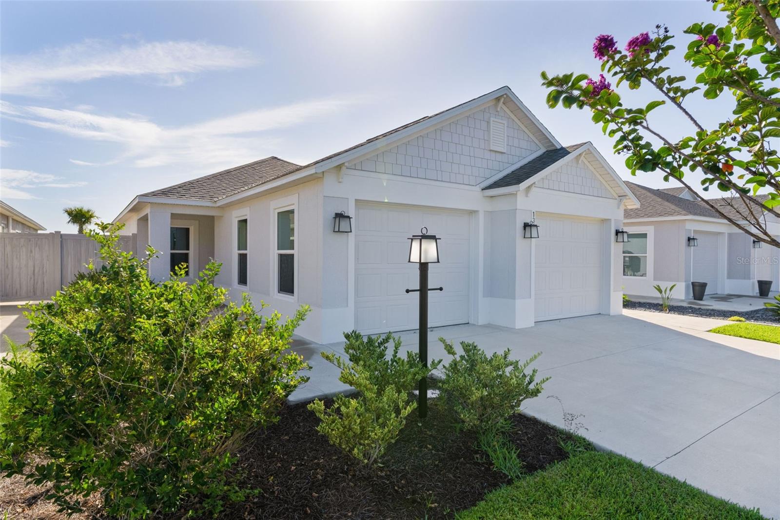 ~2024 ROOF, HVAC, HOT WATER HEATER~ ~EXPANSIVE WATER VIEW~ ~ROOM FOR POOL~
Welcome to this beautifully maintained CHARLOTTE Courtyard Bungalow Villa in the desirable SHADY BROOK, CAMPBELL VILLAS, offering serene water views, modern upgrades, and exceptional privacy. This home combines comfort and style in one impressive package. Curb appeal shines from the moment you arrive, and the spacious 2-car garage offers excellent storage along with durable COMMERCIAL POLY FLOORING, perfect for keeping the space clean and organized.  Step inside to discover soaring HIGH VAULTED ceilings and beautiful LUXURY VINYL flooring flowing through the entry, living room, kitchen, and dining area. The OPEN FLOORPLAN creates a bright and airy atmosphere ideal for both everyday living and entertaining. The kitchen is thoughtfully designed with QUARTZ countertops, STAINLESS STEEL appliances, GAS stove, recessed lighting, convenient CLOSET PANTRY, and ample cabinetry for storage. The adjoining dining area features vaulted ceilings and offers an inviting space for gatherings with family and friends. The spacious primary suite serves as a relaxing retreat, featuring a TRAY CEILING, plush carpeting, and 2 WALK-IN closets. The luxurious ensuite bath boasts a TILED ROMAN SHOWER, DUAL sinks, a separate commode area, and elevated QUARTZ countertops. Guest accommodation is equally impressive. The 2nd bedroom offers carpet, high vaulted ceilings, and a built-in closet, along with a convenient pocket door providing semi-private access to the guest bath. The guest bath features LUXURY VINYL flooring, a tub/shower combination, and elevated QUARTZ countertops. The 3rd bedroom includes carpet and a built-in closet, making it ideal for guests, hobbies, or a home office. Additional highlights include a laundry room with LUXURY VINYL flooring and a SCREENED LANAI also with COMMERCIAL POLY FLOORING with a ceiling fan, providing the perfect place to relax while enjoying peaceful water views. The spacious backyard offers ROOM FOR A POOL, allowing you to create your own private outdoor oasis. With stunning WATER VIEWS and premium upgrades, this Shady Brook Campbell Villas gem is ready for you to enjoy the very best of The Villages lifestyle. Location, Location, Location...closest to the Saluki Rec Center, and minutes by golf cart to the excitement of Eastport and Sawgrass Grove!