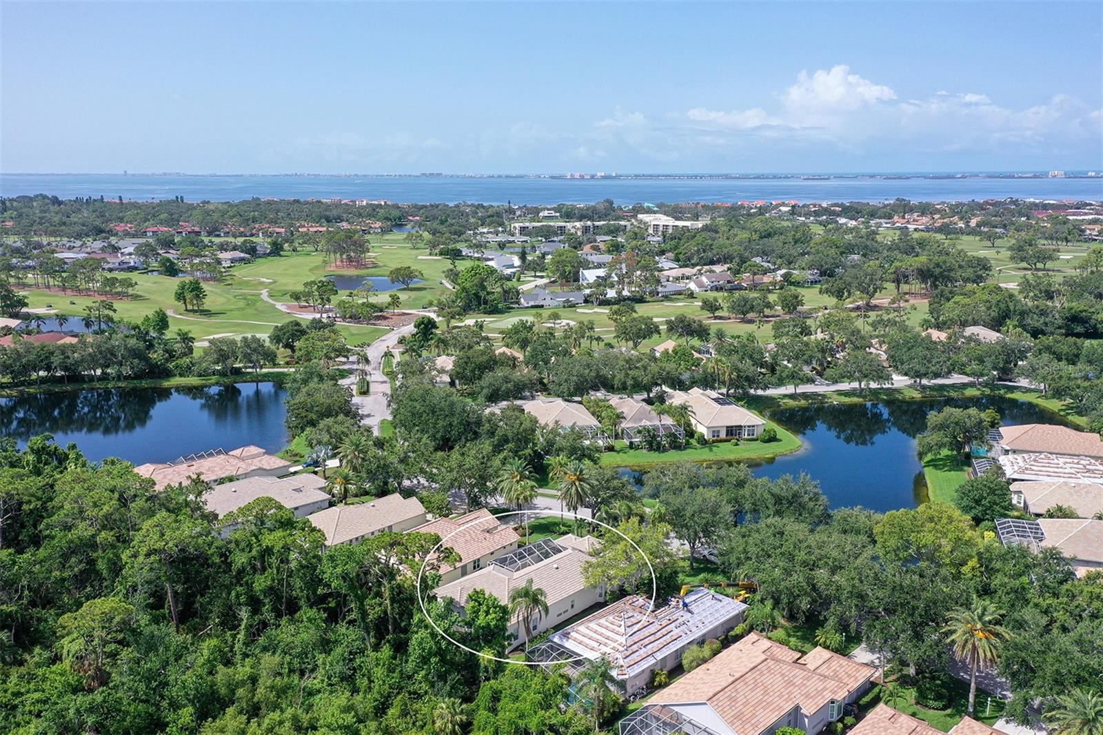 Major Price Reduction + BRAND NEW FLOORING throughout! Welcome to The Greens - a quiet, maintenance-free golf course community located outside of high-risk flood zones (‘X’ zone), just minutes from IMG Academy Golf Club and waterfront dining. Enjoy a serene private preserve backdrop, a secluded courtyard design, and a versatile casita/in-law suite — with new pool plans available upon request! This Sedona floor plan—the builder’s premier design—offers over 2,700 sq ft of thoughtfully designed living space centered around a private screened courtyard retreat. Inside, you’ll find soaring 12-foot ceilings, new luxury plank flooring, abundant natural light, and a flexible layout ideal for everyday living or hosting extended family. The detached casita, with its own entrance, full bath, and walk-in closet, provides a perfect space for guests or in-laws. The open kitchen, finished with neutral stone countertops, flows seamlessly into the dining room, breakfast nook, and leisure room with French doors overlooking the sunlit courtyard. On the preserve side, the primary suite offers peaceful wooded views, dual walk-in closets, and a spacious ensuite bath. A second bedroom with French doors opens to the courtyard—ideal as a guest room or home office. The private courtyard enjoys southern exposure, making it the perfect setting for outdoor dining—or a future pool oasis (concept available). A dedicated laundry room and two-car garage offer added functionality and storage, with ample space for a golf cart. Built in 1997 with solid block construction, the home was updated in 2023 with a new HVAC system and water heater, and includes PVC plumbing for lasting peace of mind. The Greens is an intimate 43-home enclave, quietly tucked away with a single entry point—offering privacy and a relaxed pace, while staying close to IMG Academy, Gulf beaches, SRQ Airport, and Downtown Sarasota. The IMG Academy Golf clubhouse is a short cart ride away with various optional membership opportunities, including fitness and social, with a beautiful waterfront restaurant on Sarasota Bay (open to the public). Come see the lifestyle for yourself—schedule your tour today!