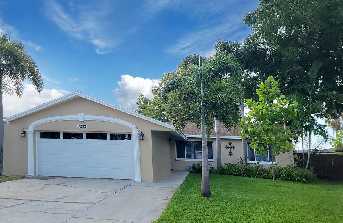 Beautiful Seminole Pool Home with Spa. This beautifully maintained custom home truly has it all—modern upgrades, exceptional outdoor living, 4-bedroom, 2-bath pool home. Thoughtfully updated with major improvements and premium features, this move-in-ready home combines comfort, efficiency, and peace of mind. Offering 1,687 square feet of comfortable living space on a desirable corner lot. The spacious chefs kitchen features barrel ceiling, granite countertops, under cabinet lighting, and overlooks the pool and patio areas, making it ideal for everyday living and entertaining. Step outside to your private backyard oasis complete with a screened pool and relaxing spa, perfect for enjoying Florida's year-round sunshine. The fully fenced yard with 5 zone irrigation system and well offers plenty of space for pets, play, and outdoor gatherings, with green grass all year round. Recent updates include a new roof, new HVAC system, fresh exterior paint, new insulated garage door with decorative windows, and a recent water heater, allowing you to move in with confidence.
 A standout feature is the oversized garage with its own dedicated 2-ton air conditioning system, making it the perfect climate-controlled workshop, fitness room, hobby space, or additional storage area. Additional upgrades include: • Whole-house natural gas backup generator • Whole-house water filtration and softener system • Whole-house dehumidifier • Automated window blinds • LED lighting throughout • Spacious primary suite featuring dual shower heads Ideally located in the heart of Seminole, this home offers easy access to downtown St. Petersburg, Tampa, award-winning Gulf beaches, top-rated schools, shopping, restaurants, parks, and Tampa International Airport. Parking space for RV or a boat. Whether you're commuting or enjoying the Florida lifestyle, this location is hard to beat.
