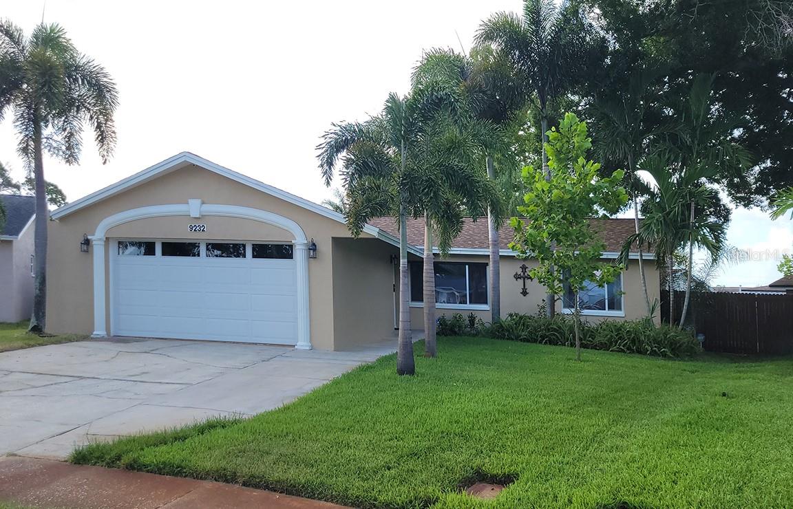 Beautiful Seminole Pool Home with Spa. This beautifully maintained custom home truly has it all—modern upgrades, exceptional outdoor living, 4-bedroom, 2-bath pool home. Thoughtfully updated with major improvements and premium features, this move-in-ready home combines comfort, efficiency, and peace of mind. Offering 1,687 square feet of comfortable living space on a desirable corner lot. The spacious chefs kitchen features barrel ceiling, granite countertops, under cabinet lighting, and overlooks the pool and patio areas, making it ideal for everyday living and entertaining. Step outside to your private backyard oasis complete with a screened pool and relaxing spa, perfect for enjoying Florida's year-round sunshine. The fully fenced yard with 5 zone irrigation system and well offers plenty of space for pets, play, and outdoor gatherings, with green grass all year round. Recent updates include a new roof, new HVAC system, fresh exterior paint, new insulated garage door with decorative windows, and a recent water heater, allowing you to move in with confidence.
 A standout feature is the oversized garage with its own dedicated 2-ton air conditioning system, making it the perfect climate-controlled workshop, fitness room, hobby space, or additional storage area. Additional upgrades include: • Whole-house natural gas backup generator • Whole-house water filtration and softener system • Whole-house dehumidifier • Automated window blinds • LED lighting throughout • Spacious primary suite featuring dual shower heads Ideally located in the heart of Seminole, this home offers easy access to downtown St. Petersburg, Tampa, award-winning Gulf beaches, top-rated schools, shopping, restaurants, parks, and Tampa International Airport. Parking space for RV or a boat. Whether you're commuting or enjoying the Florida lifestyle, this location is hard to beat.