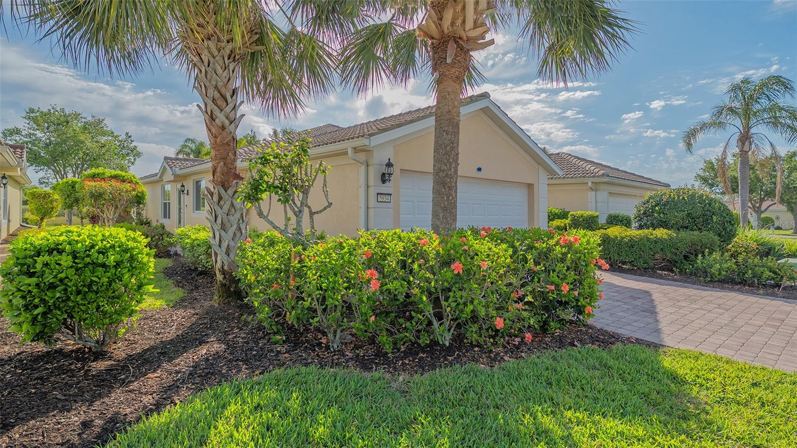 Very popular Carrington floor plan, paired villa with private preserve views. 3 bedrooms, 2 baths with an open floor plan (3rd bedroom could be a den). Kitchen features wood cabinets, granite counters & stainless steel appliances. Tiled throughout the living area. Carpet in Master bedroom & 1  guest bedroom. Extended screened lanai backing to preserve for total privacy. Ac is 5 years old & hurricane shutters for windows & doors. Move in ready.  Community features resort style amenities: heated pool, tennis, fitness center, clubhouse, bocce court & playground. Located on Popular  Palmer Ranch near world famous Siesta Key Beach,  shopping, golf, restaurants, Legacy Bike Trail, YMCA & easy access to I-75