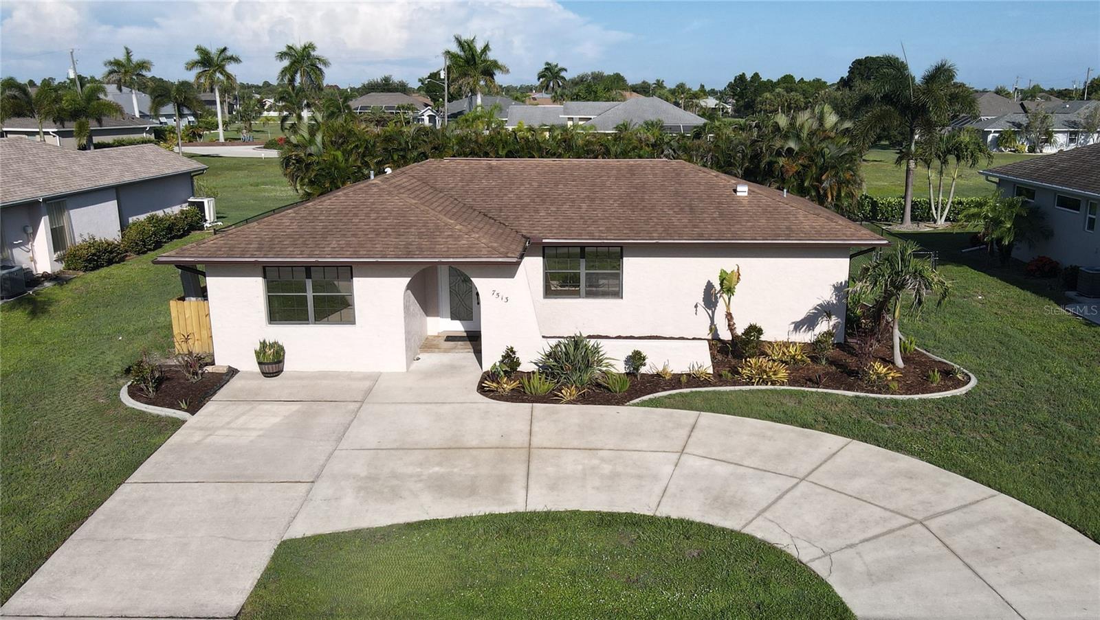 **PLEASE ENJOY THE 3D INTERACTIVE VIRTUAL TOUR ASSOCIATED WITH THIS LISTING - Hard to Find! Beautifully updated and priced under $250,000, this move-in-ready 3-bedroom, 2-bath home in Burnt Store Meadows offers exceptional value. A newer roof, fresh interior paint and tile flooring throughout create a clean, modern feel from the moment you step inside. The beautifully remodeled kitchen is the heart of the home, featuring granite countertops, solid surface finishes and brand-new stainless steel appliances — perfect for both everyday living and entertaining. The spacious primary suite serves as a private retreat, complete with a luxurious en-suite bath showcasing a double walk-in shower and a relaxing jetted soaking tub. Step outside to the screened lanai and enjoy the oversized, fully fenced backyard with mature landscaping and a tranquil greenbelt view. Whether you're entertaining guests, hosting family gatherings or simply unwinding in your own private oasis, this outdoor space offers endless possibilities. With extensive updates, a desirable location in Burnt Store Meadows and an unbeatable price, this home is a rare opportunity you won't want to miss. Schedule your private showing today!