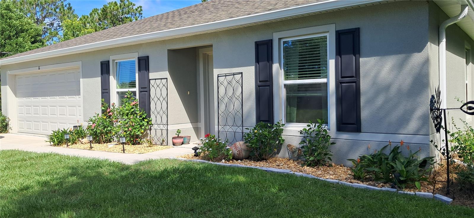 Home was built in 2024 and is like brand new with several upgrades.  The beach is just a short drive away.  This three bedroom two bathroom and two car garage has an open floor plan great for entertaining.  The home has a den/office, split bedroom floor plan, master has walk-in closet with large bathroom including linen shelving and ample storage space and separate laundry room. . This home has an open floor plan making the home perfect for entertaining. The kitchen opens up into the main living room area along with breakfast bar and dinning room.  
Private lot adjoins two green spaces that can never be built on.
Beautiful sunsets and wildlife viewing from back yard and living room.
Deer and other wildlife sightings are common.  
Newly installed large concreate patio just off the living room sliding glass doors along with other improvements including;
gutters, blinds, automatic garage door opener, enclosed den/office area and remodeled tub to shower, established landscaping and lawn.