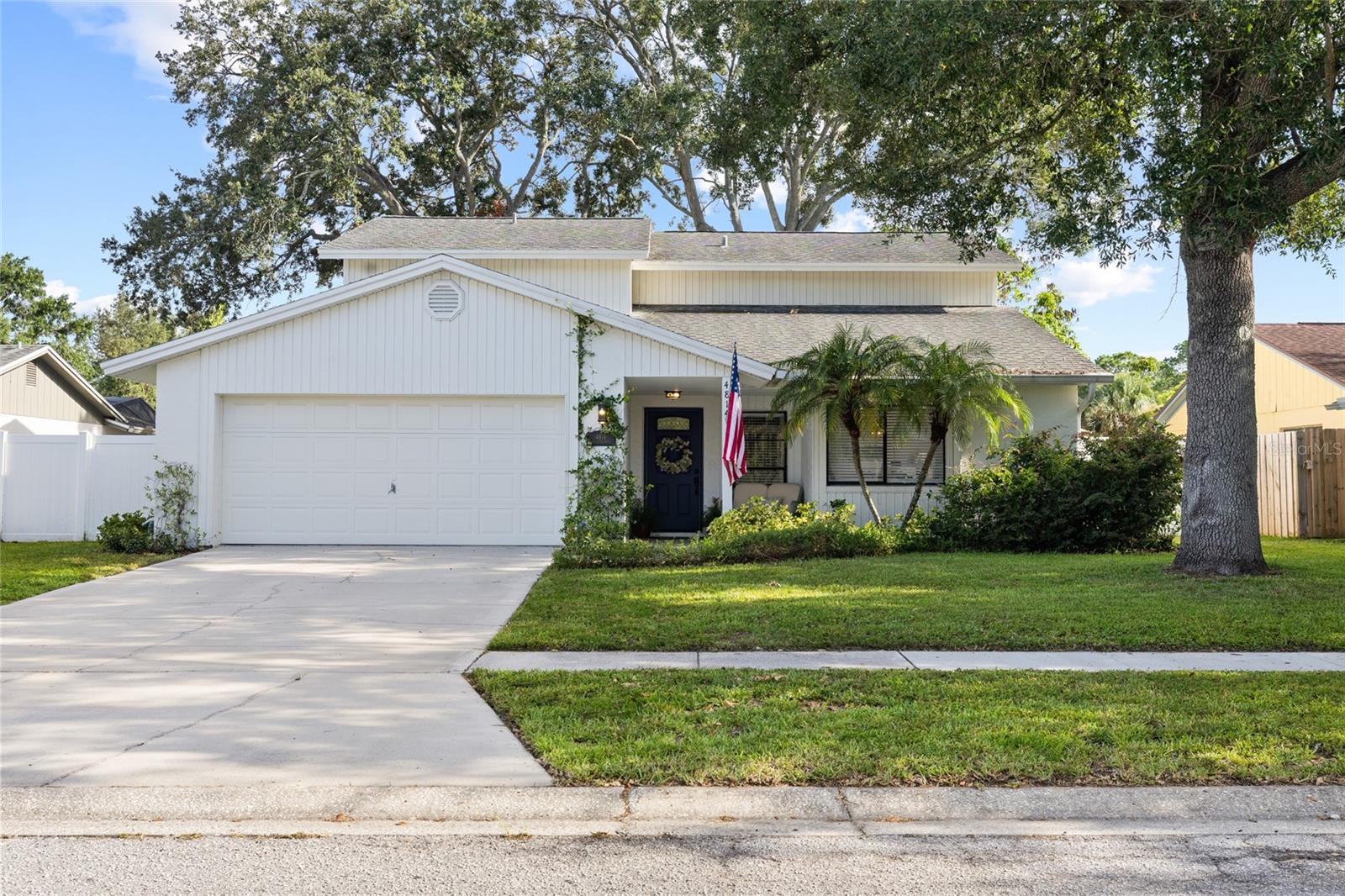Welcome to 4814 Fox Hunt Drive, a beautifully updated 4-bedroom, 2.5-bath residence nestled in the highly desirable Northdale/Carrollwood area of Tampa. From the moment you step inside, you’re greeted by an inviting foyer that opens to spacious dual living areas—perfect for a formal sitting room, family room, or even a game room setup to fit your lifestyle.Vaulted ceilings and expansive windows flood the entry and formal living space with natural light, creating a bright, airy, and welcoming ambiance. The thoughtfully updated kitchen features sleek quartz countertops, stainless steel appliances, and a generous walk-in pantry—ideal for both everyday living and entertaining.The primary suite offers a relaxing retreat, complete with a well-appointed en-suite bathroom featuring dual vanities, a glass-enclosed shower, and custom built-ins within the walk-in closet. Three additional bedrooms provide ample flexibility for a growing family, guests, or a home office. A convenient half bath on the main level adds functionality for everyday living.Step outside to your private backyard, where a screened patio invites you to relax, entertain, and enjoy the Florida sunshine year-round. Whether hosting gatherings or unwinding after a long day, this outdoor space delivers comfort and versatility.Located in a sought-after community, this home offers easy access to top-rated schools, scenic parks, and a wide variety of dining and shopping options. Enjoy the convenience of walking to one of Country Place’s two parks or taking a short drive to Publix, Target, Whole Foods, and more. With all that Tampa has to offer just moments away, this home truly combines comfort, style, and location.