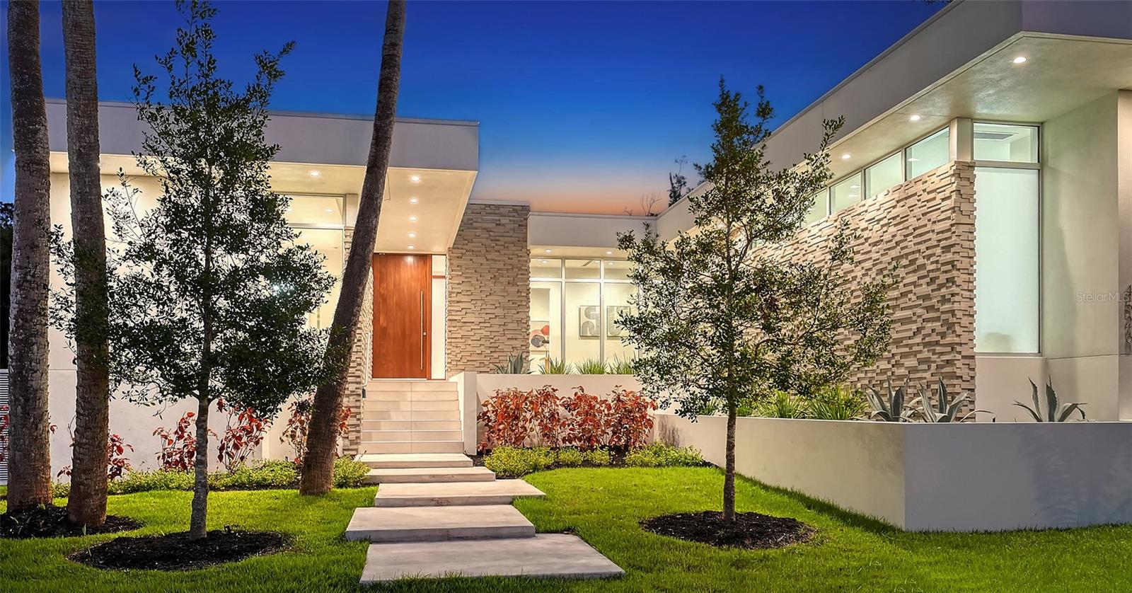 This stunning contemporary home with Guest House combines convenient secure living in a home built to the latest codes with living in the sought after historic community of Indian Beach. This lovely established neighborhood is known for it's "Old Florida" feeling with its extraordinary tree canopy, lush vegetation, and the mixture of impressive mansions, eclectic and modern homes. The Main House offers 3 bedrooms, each with en-suite bath plus a office/den, a powder room and a 3-car garage. The open great room, kitchen and dinning room seamlessly lead to the very private covered terrace, pool and spa area with southern orientation. The separate Guest House in the back is designed as a Studio with full bath, walk-in-closet, kitchenette and offers ample privacy for guests. All concrete block construction and custom high-end materials are used for this home. Situated in popular Indian Beach, which is also referred to as the Museum Area, because it stretches "West of Trail" just North of Downtown Sarasota along the Sarasota Bayfront to South of the Ringling Museum and Ca'd'Zan. Downtown Sarasota, Sarasota-Bradenton Int'l Airport, New College of Florida, USF Sarasota Manatee Campus, Jungle Gardens, St. Armand's Circle and Lido Beach are just a short drive away. This neighborhood offers waterfront parks with beautiful views of the Bay for everyone to enjoy.
