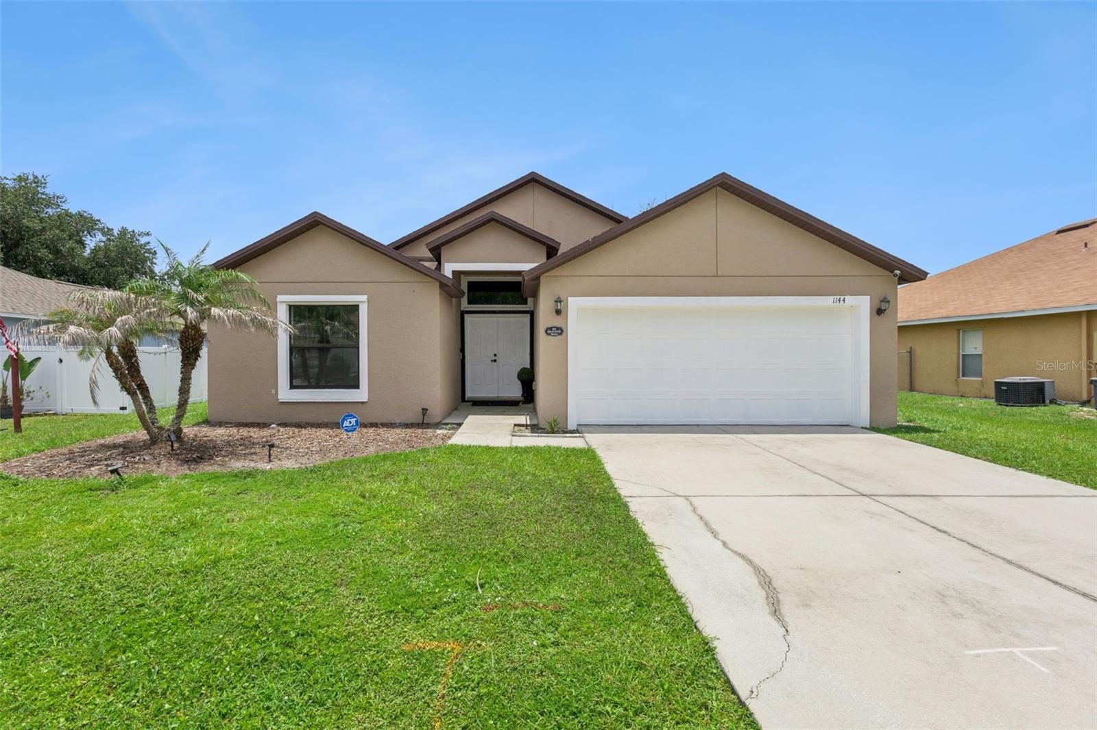 Welcome to this beautifully maintained 4-bedroom, 2-bath home in the heart of Poinciana, offering the perfect blend of style, comfort, and energy efficiency. From the impressive double-door entry and oversized foyer to the soaring ceilings and open-concept floor plan, this home creates a bright and inviting atmosphere from the moment you arrive.

The homeowner has refreshed the kitchen with bright, light cabinetry and updated lighting fixtures, complementing the granite countertops, recessed lighting, 36-inch upper cabinets, stainless steel appliances, and breakfast bar overlooking the spacious living and dining areas, making it ideal for everyday living and entertaining.

The private primary suite offers a relaxing retreat with dual vanities, a garden tub, separate shower, and generous closet space. New carpeting in the front bedroom adds a fresh touch, while ceramic tile throughout the main living areas provides durability and easy maintenance.

Additional highlights include an interior laundry room, 5¼-inch baseboards, double-pane insulated Low-E windows and sliding glass doors designed to enhance energy efficiency, and full-home hurricane shutters for added peace of mind.

Conveniently located near shopping, dining, parks, schools, medical facilities, and major roadways, this move-in ready home offers exceptional value in one of Poinciana's most desirable locations.

The home is equipped with solar panels that help significantly reduce monthly electricity costs while enhancing overall energy efficiency. Buyer will assume the existing solar lease at closing. Ask for details.