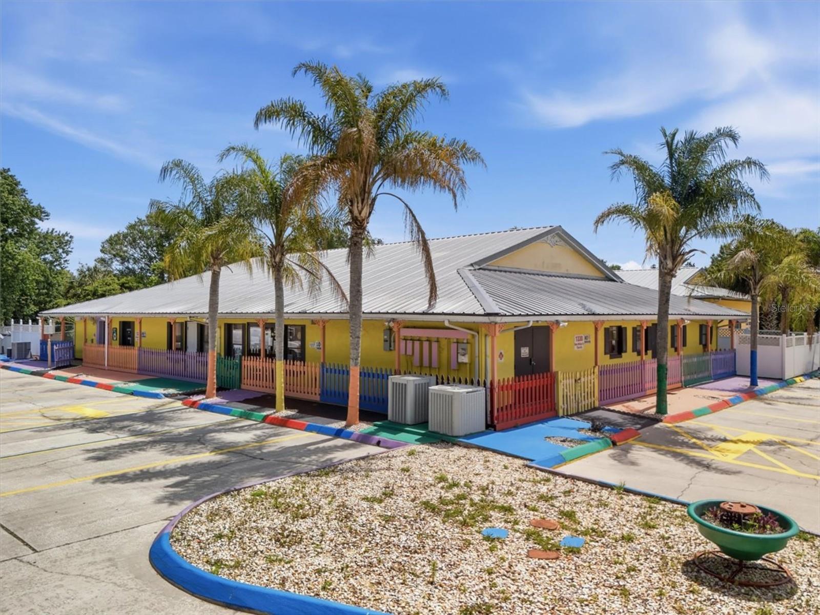 Fully Operational, Well-Established Academy. The academy maintains a high enrollment rate and strong community presence. Excellent investment for an owner-operator or portfolio expansion. Main facility features approx 5400sf block construction with a durable metal roof along with a spacious 1264sf covered porch area. Property also incudes over 20,000+sf of concrete paved areas, ideal for play, parking, and daily operations, and is secured with both vinyl and wood fencing. Sale includes 2-2022 transport vans with low mileage and other plentiful inventory for operating needs making this a true plug-and-play opportunity. A rare chance to acquire both a successful business and the real estate in a growing area with continued demand for childcare and educational services.