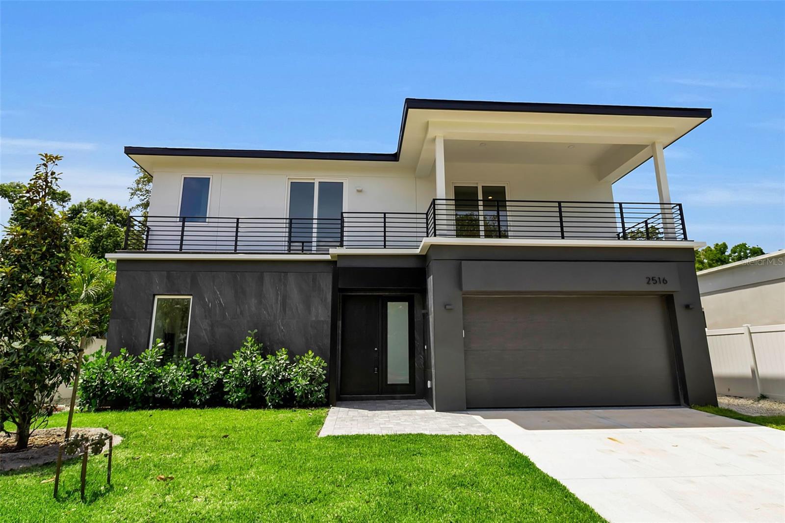 Brand-new modern two-story home, offering luxury living and exceptional investment potential in the heart of Sarasota. This thoughtfully designed residence features 5 bedrooms, 4 bathrooms, and an attached 2-car garage, with an open-concept kitchen and living space showcasing premium Italian-imported flooring, cabinetry, and designer fixtures. Large sliding doors open seamlessly to a private outdoor deck and pool, creating the perfect setting for entertaining and enjoying Florida’s indoor-outdoor lifestyle. Located within Sarasota city limits, this property qualifies for weekly rentals, making it an outstanding opportunity for a primary residence, seasonal retreat, or income-producing investment. Just minutes from Downtown Sarasota, Siesta Key Beach, and St. Armands Circle, with convenient access to world-class dining, boutique shopping, cultural attractions, and Sarasota’s award-winning Gulf beaches. Nearby parks, tennis and pickleball courts, and the Legacy Trail extension provide endless outdoor recreation. Secure a brand-new modern Sarasota home in a highly desirable location.