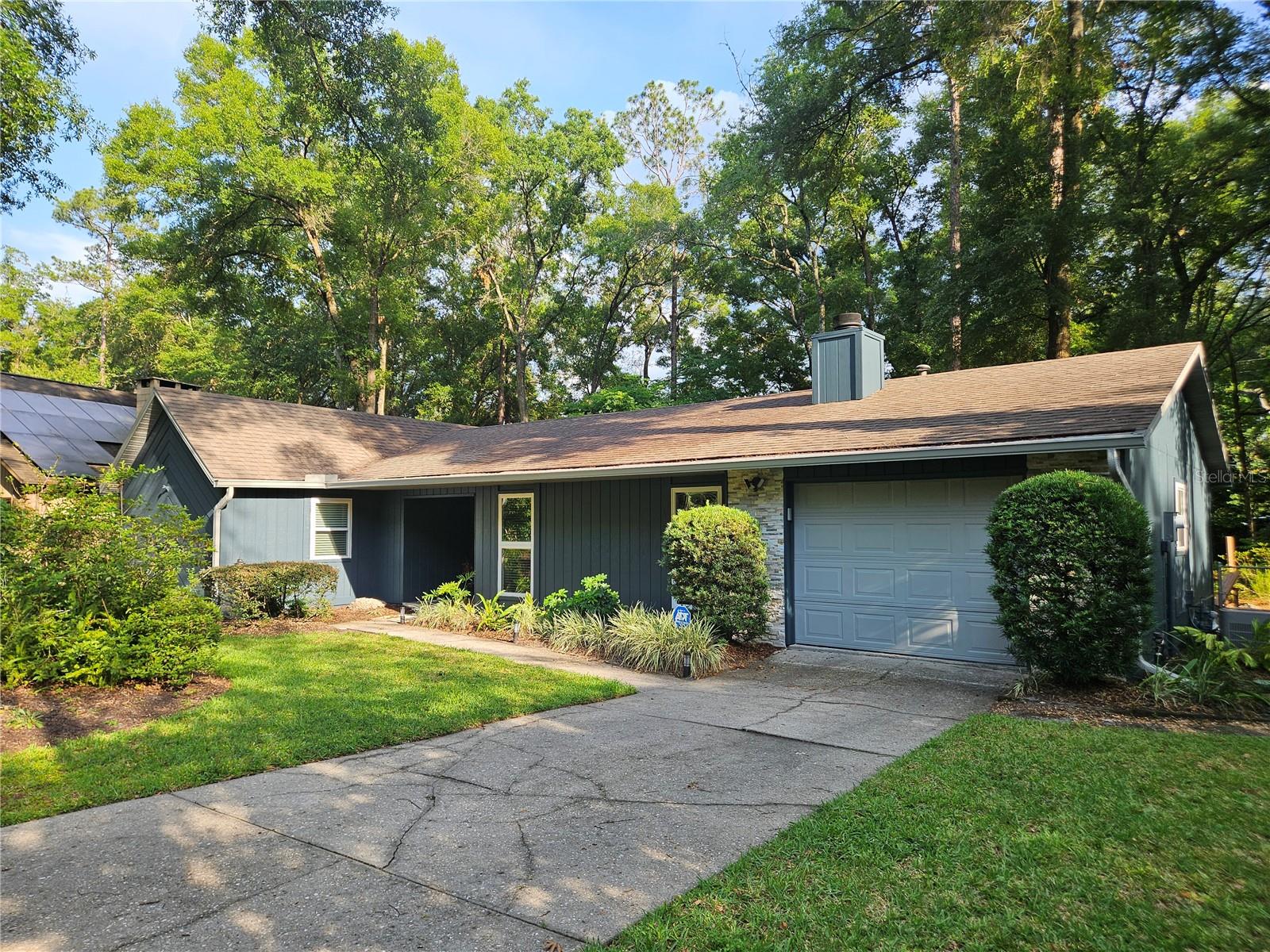 Welcome home to this charming 3-bedroom, 2-bathroom residence conveniently located just off Tower Road in southwest Gainesville. Enjoy easy access to The Oaks Mall, North Florida Regional Medical Center, the University of Florida, UF Health Shands Hospital, Butler Plaza, Celebration Pointe, and countless dining, shopping, and entertainment options.

This well-maintained home offers a spacious and inviting living area featuring a beautiful stone fireplace, attractive flooring throughout, and a functional kitchen equipped with quality appliances. Just off the kitchen, you'll find a dedicated laundry room and an attached garage complete with a built-in workbench area, perfect for projects, storage, or additional workspace.

Step outside to the screened-in back porch, an ideal spot to relax and unwind while overlooking the large, peaceful backyard. With its convenient location, comfortable layout, and desirable features, this home offers the perfect blend of convenience and comfort.

BEWARE of potential fraud. This home is professionally managed by Pepine Property Management. We do NOT ask any of our potential residents to wire funds. Our main office is located in Gainesville, Florida.

Renter’s insurance is mandatory for all tenants. A policy with at least $100,000 in liability coverage must be provided before move in.

Move In Costs:
- $75 Application Fee Per Adult. Each adult must complete a separate application.
- Security Deposit/Holding Deposit Starts @ 1 Months' Rent (may increase depending on screening)
- $250 Administrative Fee
- $350 Non-Refundable Pet Fee Per Pet (pets must be approved. Max 2 pets per property)
- $35 Per Month Pet Rent

We use a third-party service, PetScreening, to ensure all applicants understand how to adhere to the property's pet and animal policies, even if you do not have a pet or animal. All applicants must complete a Pet, No Pet, or Animal Profile.