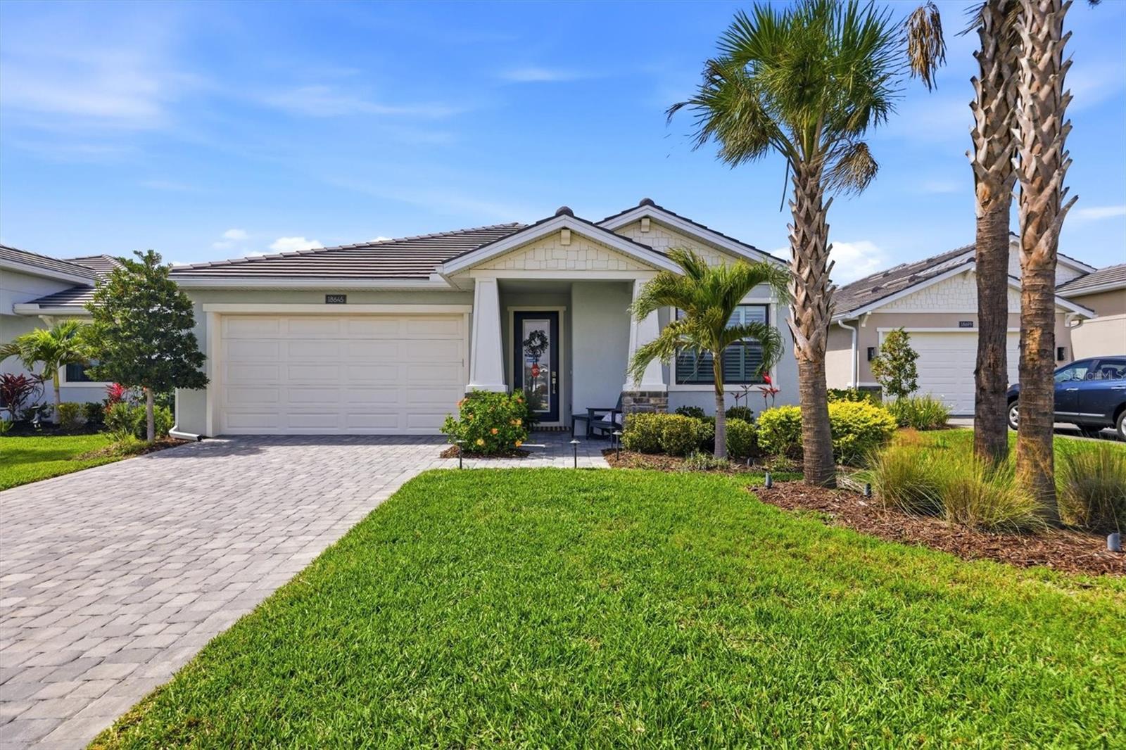 Experience refined Florida living in this exceptional residence located in the sought-after community of Solstice in Wellen Park, masterfully built by luxury builder Toll Brothers. Designed with quality craftsmanship and upscale finishes throughout, this extensively upgraded home offers 3 bedrooms plus a flex room, 2.5 baths, and an oversized 2.5-car garage.

From the moment you enter, you’ll appreciate the custom built-in features including designer bookshelves and custom cabinetry in the foyer and flex room, creating both elegance and functionality. The open-concept design is enhanced by 8-foot interior doors, nickel floor outlets in the great room, custom window treatments, plantation shutters throughout, and motorized shades on the great room sliding doors. The home also features built-in speakers with home theater and music wiring in the great room and lanai, along with a sound system and subwoofer, creating an exceptional indoor and outdoor entertainment experience.

The gourmet kitchen was thoughtfully designed for both entertaining and everyday living, featuring extended cabinetry, quartz countertops with marble backsplash, a large storage island, under-cabinet lighting, and a custom walk-in pantry with pullout drawers and shelving. The appliance suite includes a six-burner natural gas range with stainless-steel vent hood and built-in wall oven. The dining area is accented with luxurious linen silk designer curtains for an added touch of sophistication.

The spacious primary suite offers a peaceful retreat with tray ceilings, plantation shutters, and a spa-inspired en suite bath complete with double vanity, a glass-enclosure walk-in shower, and a custom-designed walk-in closet with built-in storage. The guest bath also features an upgraded walk-in shower with glass enclosure.

Additional features and upgrades include smart home technology, a natural gas tankless water heater, whole-house natural gas generator, whole-house water treatment system, hurricane-impact windows, and the added benefit of being located in an X flood zone.

Step outside into your private outdoor oasis overlooking tranquil views. The screened lanai showcases a heated saltwater pool and spa with waterfall feature and LED color-changing lighting. The fully equipped outdoor kitchen includes a natural gas grill, vent hood, sink, refrigerator, granite countertops with granite and tile backsplash, built-in cabinetry, covered seating area with TV, and dual ceiling fans. The fenced backyard is professionally landscaped and complemented by a patio sitting area and front-yard landscape lighting for enhanced curb appeal.

Residents of the Solstice community at Wellen Park enjoy resort-style amenities including a zero-entry pool, fitness center, pickleball courts, clubhouse, and golf-cart-friendly living. Conveniently located near downtown Wellen Park with lakefront dining, shopping, scenic trails around the Grand Lake, live concerts, community events, and farmers markets. Nearby Gulf beaches and CoolToday Park, the spring training home of the Atlanta Braves, are just minutes away.