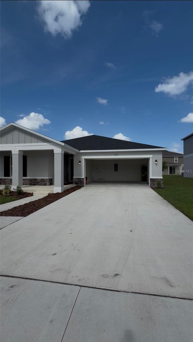 Location, lifestyle, and incredible space! Welcome to 2675 Lola Ln, beautifully situated on a rare oversized homesite. This property offers the perfect blend of tranquility and ultimate convenience, located just a short drive from the highly sought-after Lake Nona area, with easy access to the FL Turnpike and US-192. Frequent travelers will love the quick commute to Orlando International Airport. On the weekends, enjoy a round of golf at the nearby highly-rated Kissimmee Bay Country Club or Remington Golf Club, or pack a picnic and head over to Lakefront Park to enjoy the beach and splash pad. With plenty of shopping and dining options just around the corner along US-441, everything you need is right at your fingertips. Don't miss out on this fantastic opportunity!