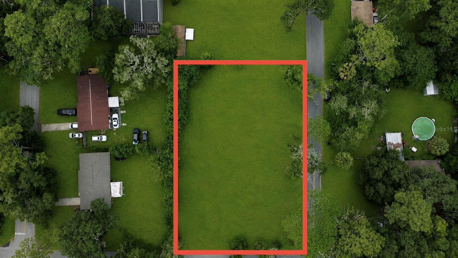 Exceptional corner lot opportunity just minutes from Downtown Ocala! This ±0.51-acre multifamily-zoned property offers outstanding development potential with approximately 175 feet of paved road frontage for excellent accessibility and visibility. Public water and public sewer are available, making future development even more convenient. Ideally located near shopping, dining, medical facilities, schools, and major roadways, this property combines the convenience of city living with endless possibilities. Whether you're looking to build multifamily units or invest in one of Ocala's growing areas, this is a rare opportunity you won't want to miss!