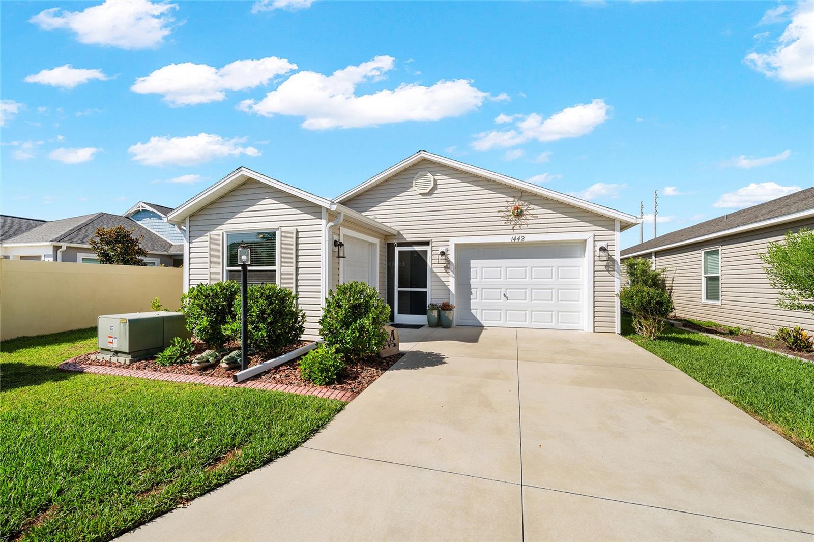MOTIVATED SELLERS!!! Don't miss the beautifully maintained Moonstone Villa offering 2BR/2BA, and an inviting open-concept floor plan that feels spacious from the moment you step inside.  This exceptional home features CERAMIC TILE throughout, and ARLO security system, and a well organized garage complete with a workbench and built in shelving.  Step outside to your own PRIVATE backyard, where you'll enjoy a SWIM SPA, cozy FIRE PIT, and a peaceful setting - perfect for relaxing or entertaining.  Conveniently located just minutes from EASTPORT, SAWGRASS GROVE, and BROWNWOOD PADDOCK SQUARE.  You will also appreciate the close proximity to MAGNOLIA PLAZA, offering shopping, dining, banking and everyday convenience.  Whether you're looking for a full-time residence or a seasonal retreat, this well maintained villa offers comfort, privacy in an outstanding location.  CALL TODAY TO SCHEDULE YOUR PRIVATE SHOWING!!