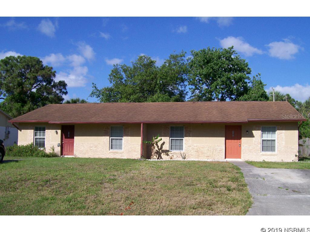 Live in one side, rent out the other--or rent both sides for the income.  Each side has 2 br/2 bath and 990 sq ft under heat/air.  Centrally located--close to shopping, dining, and just a short drive to the river or beach.