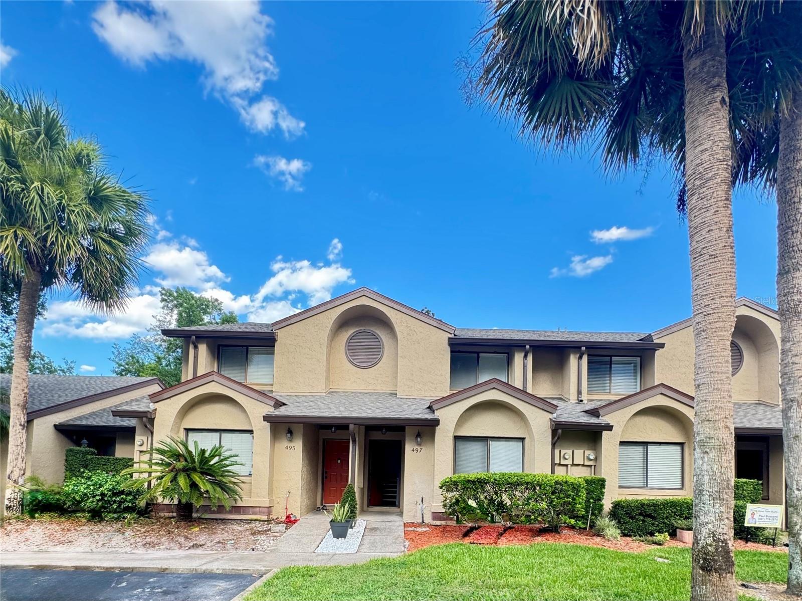 Beautiful 2/2 townhome in highly desirable Cypress Club community in The Highlands of Winter Springs, located in close proximity to SR 434! **Freshly Painted with light and neutral colors throughout! Vaulted ceiling in the very spacious/huge... family/great room with a wood burning fireplace!   Split bedroom floorplan, with one bedroom downstairs. Brand new ceiling fan in upstairs bedroom.  Tub and shower combination and linen closets in both bathrooms. Tile flooring in the living areas and laminate in the bedrooms. **Brand New Lennox A/C system and a washer and dryer included!  Screened and Covered porch and an outside storage closet for additional storage.  Two pools:  the Cypress Club Community pool, and The Highlands master community pool!  Brand new roofs in the community, HOA covers building insurance and grounds maintenance.  Two assigned parking spaces. The community offers a fabulous club house, nature walking trails, parks, playground and tennis courts.  Located close to shops and restaurants and very close to SR 434, SR 17/92 and SR 417 for easy commuting.